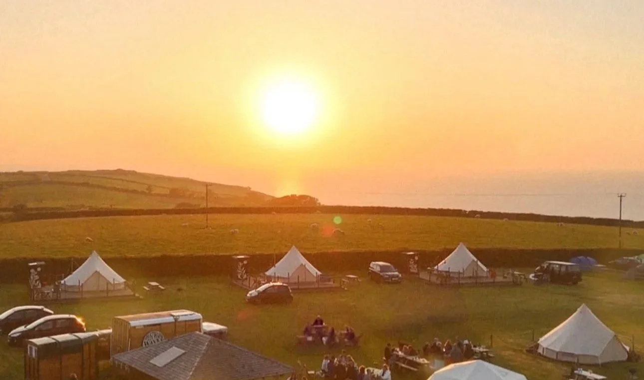 Sunset over Livit Adventures and Glamping, the glamping site that the Drift Sauna will be at in summer 2026.