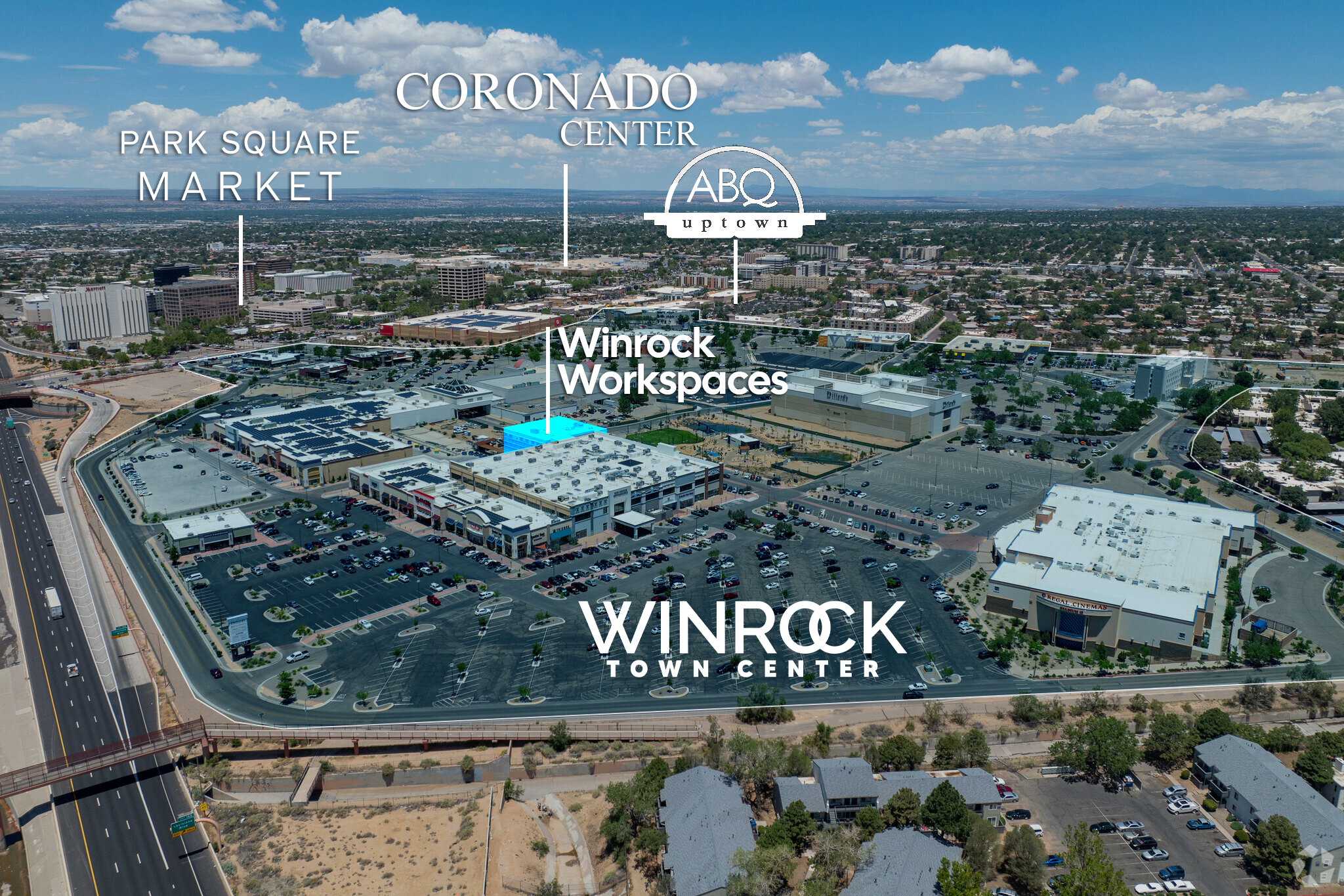 Aerial view of Winrock Town Center with labeled landmarks including Winrock Workspaces, ABQ uptown, Coronado Center, Park Square Market, and surrounding Uptown cityscape with roads, parking lots, and buildings under a partly cloudy sky.