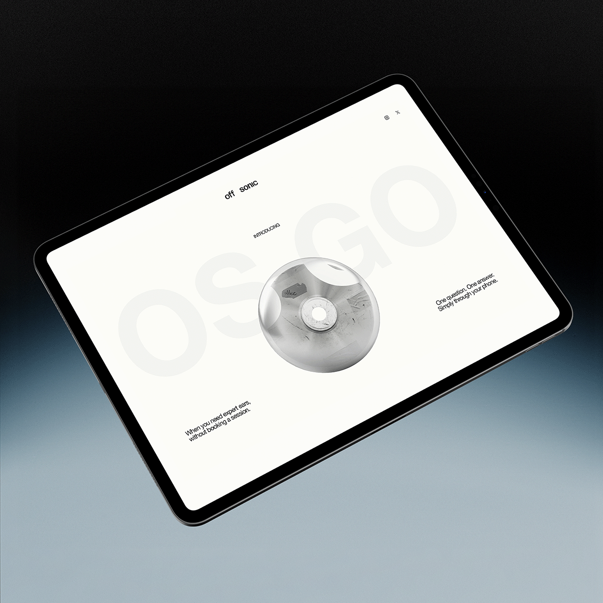 Digital device screen with promotional content for OFF SONIC, featuring a reflective spherical object in the center and text about booking sessions or answering questions through a phone.