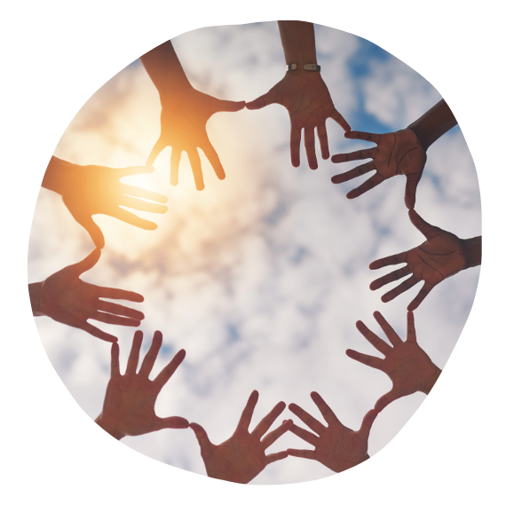 Multiple hands reaching towards the sky, forming a circle against a partly cloudy sky with sunlight.