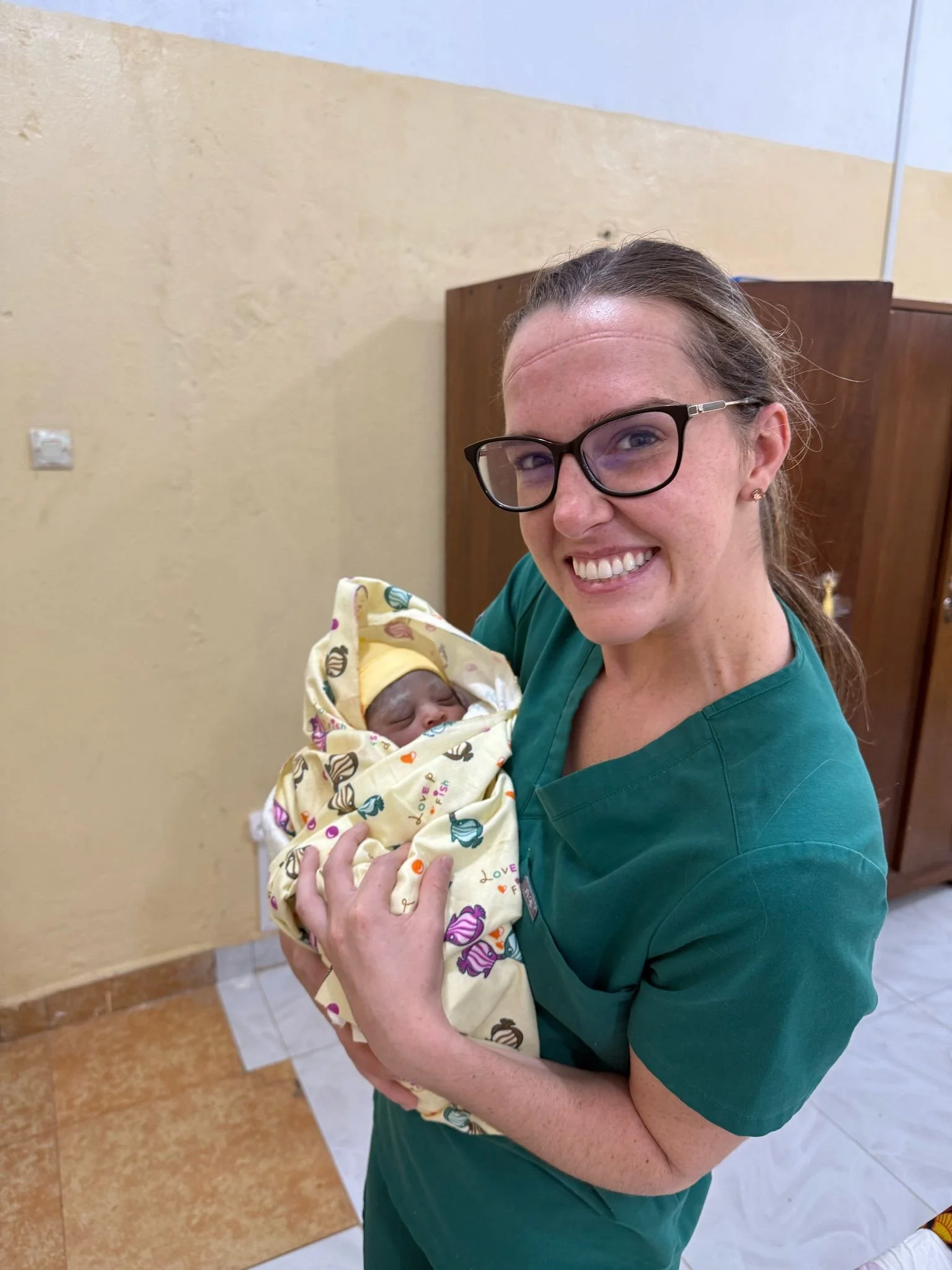 megan happy holding newborn.JPG