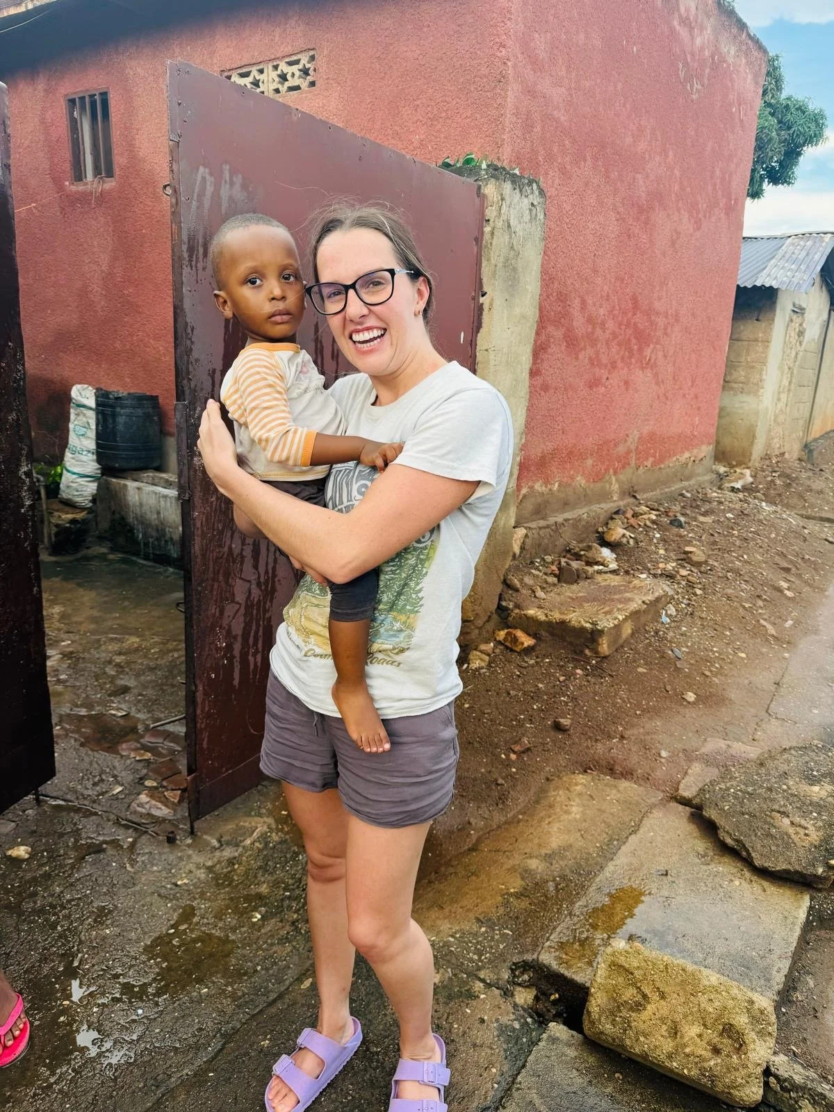 megan holding child at orphanage (1).JPG