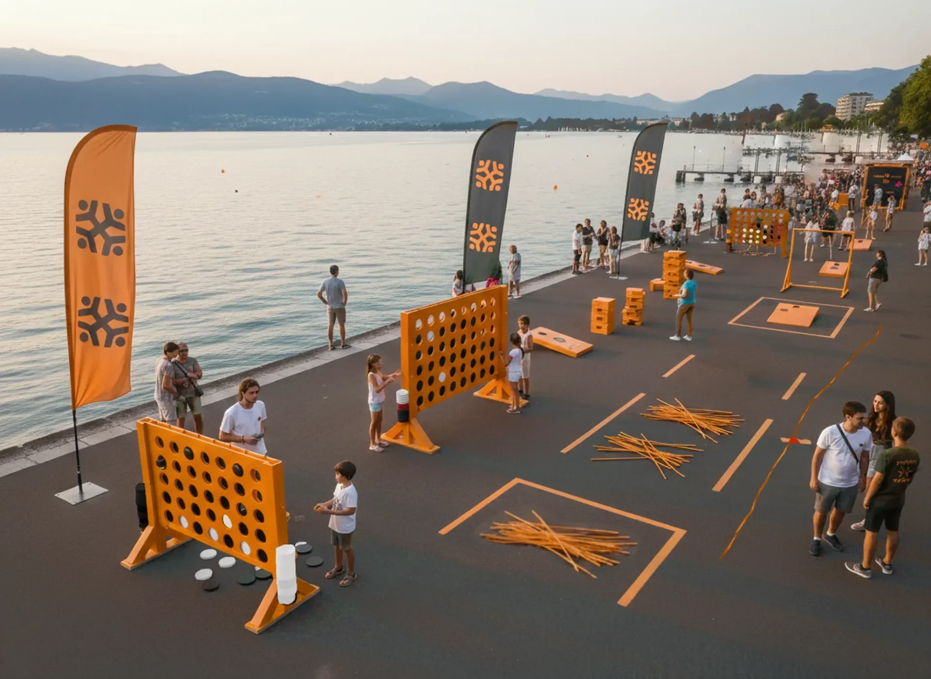 Zone d’animation TakTakTak avec jeux géants en bois installés lors d’un événement public en plein air.