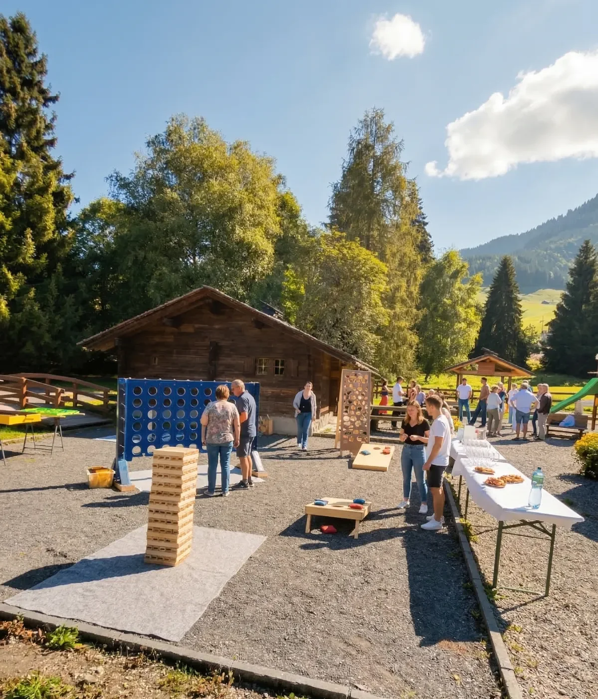 People playing outdoor games and socializing in a sunny backyard with wooden cabins and lush trees, with a mountain in the background.