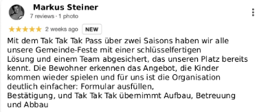 Screenshot of a Google review written in German about community events, mentioning organization, children's games, and team efforts.