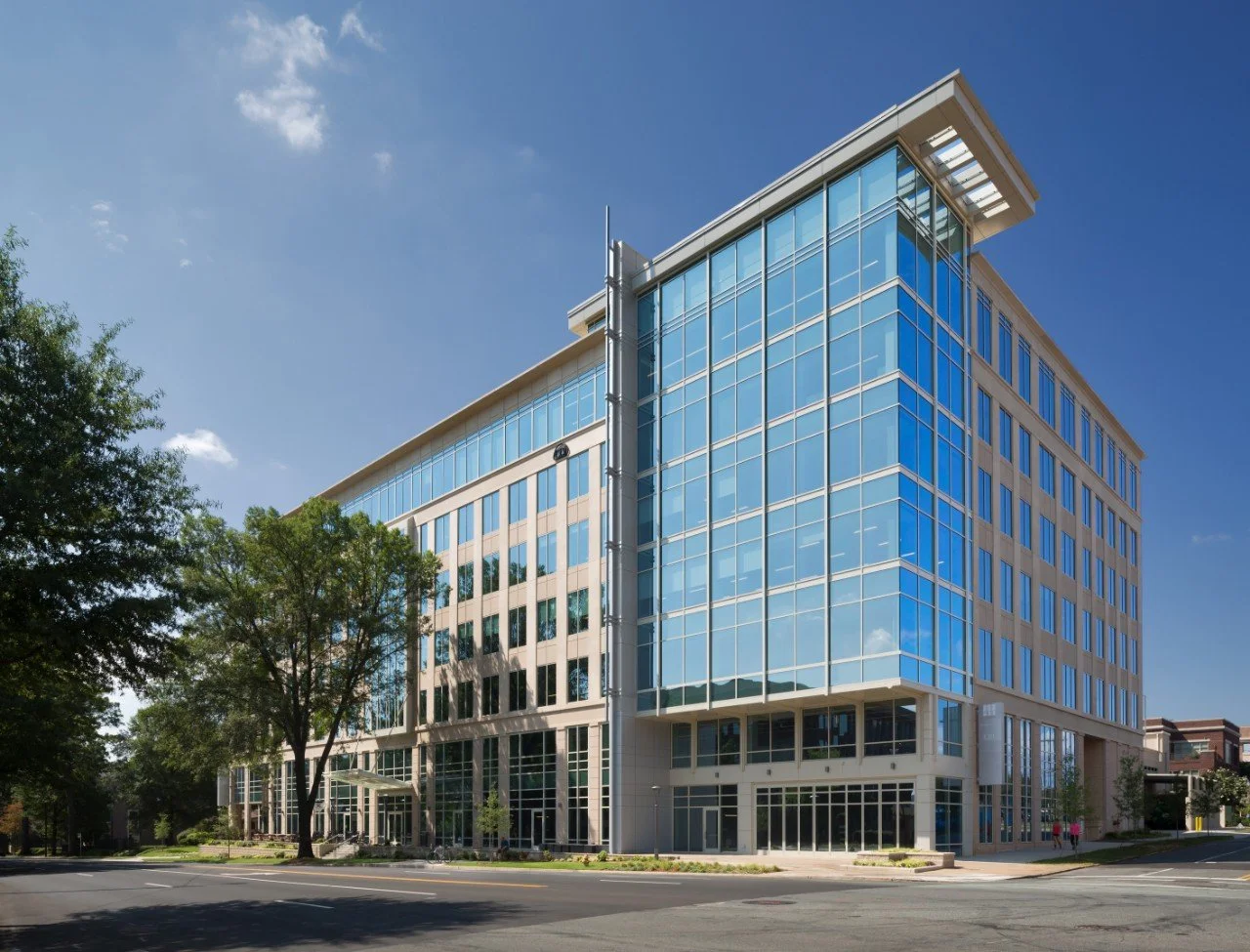 Exterior of a modern glass corporate office building