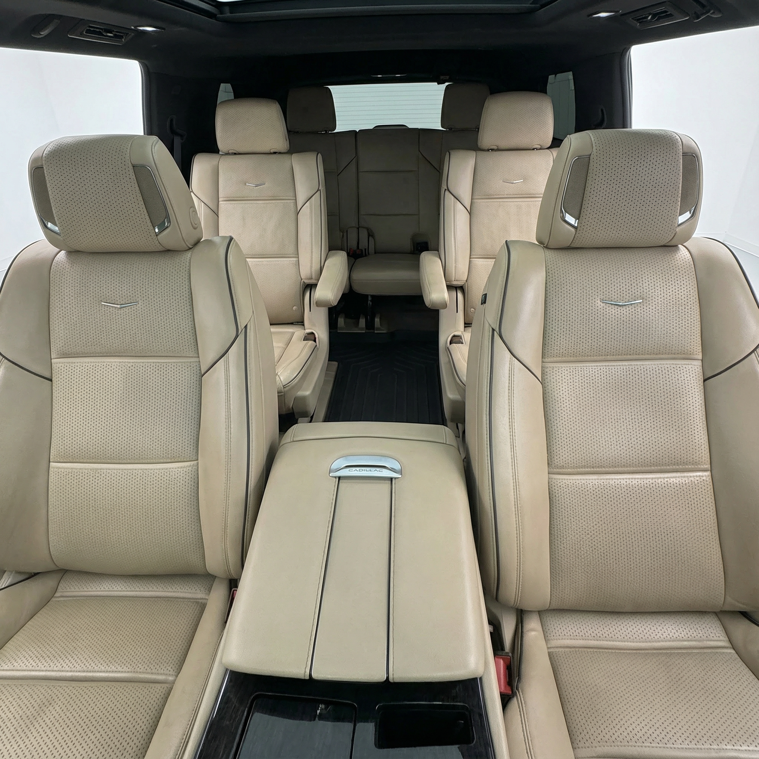 Interior view from the front seat of a 2022 white Cadillac Escalade