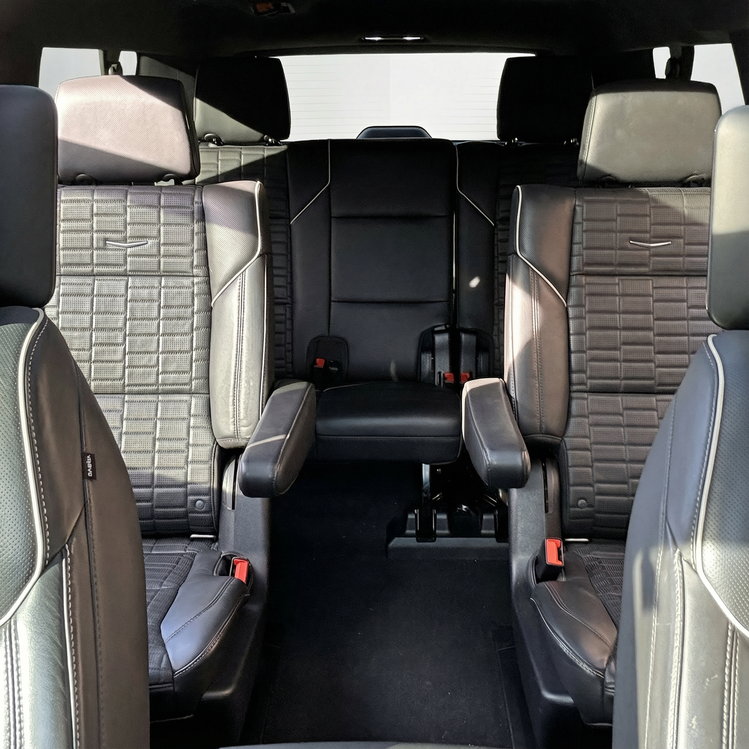 Interior view from the front seat of a 2021 black Cadillac Escalade ESV