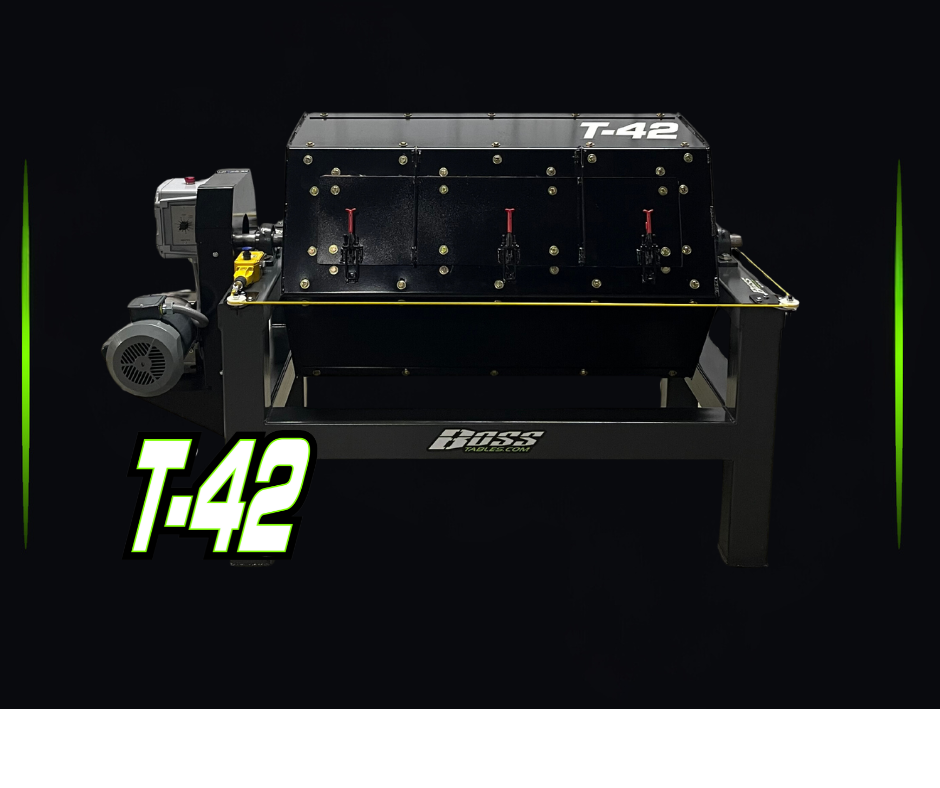 A black, rectangular device labeled T-42 with a motor on the left side, mounted on a black frame, with the T-42 logo in neon green and white at the bottom left against a black background.