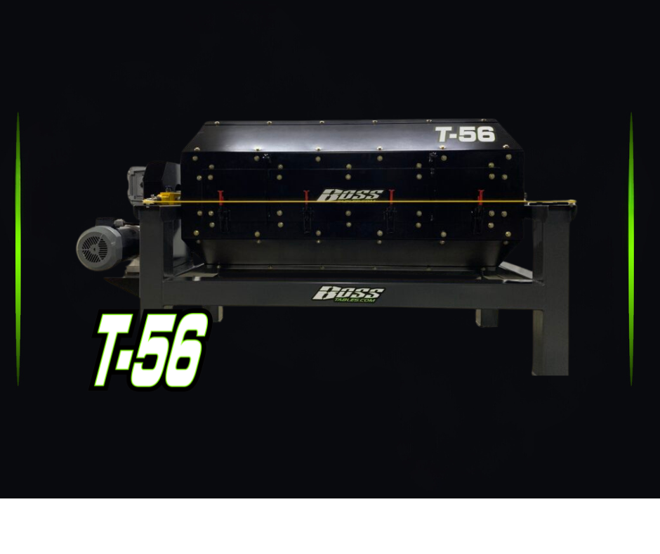 A BOSS T-56 foosball table with black playing surface, yellow rods, and side panels, set against a dark background with green and white labels.