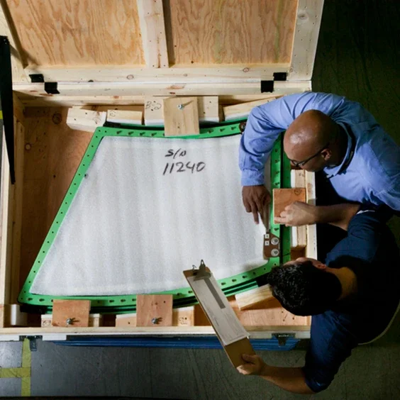 maintenance technicians working on private jet parts