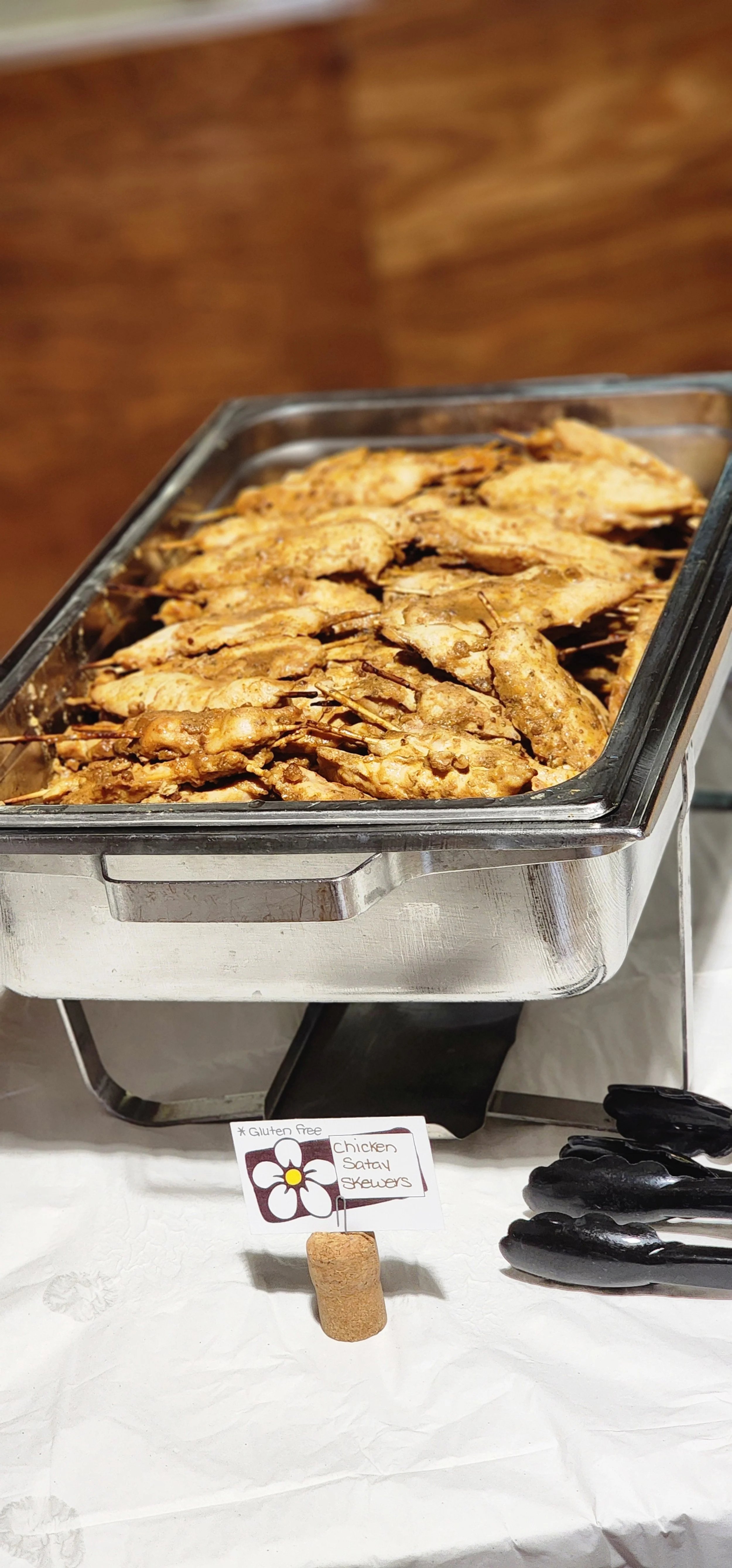 A dish of chicken skewers