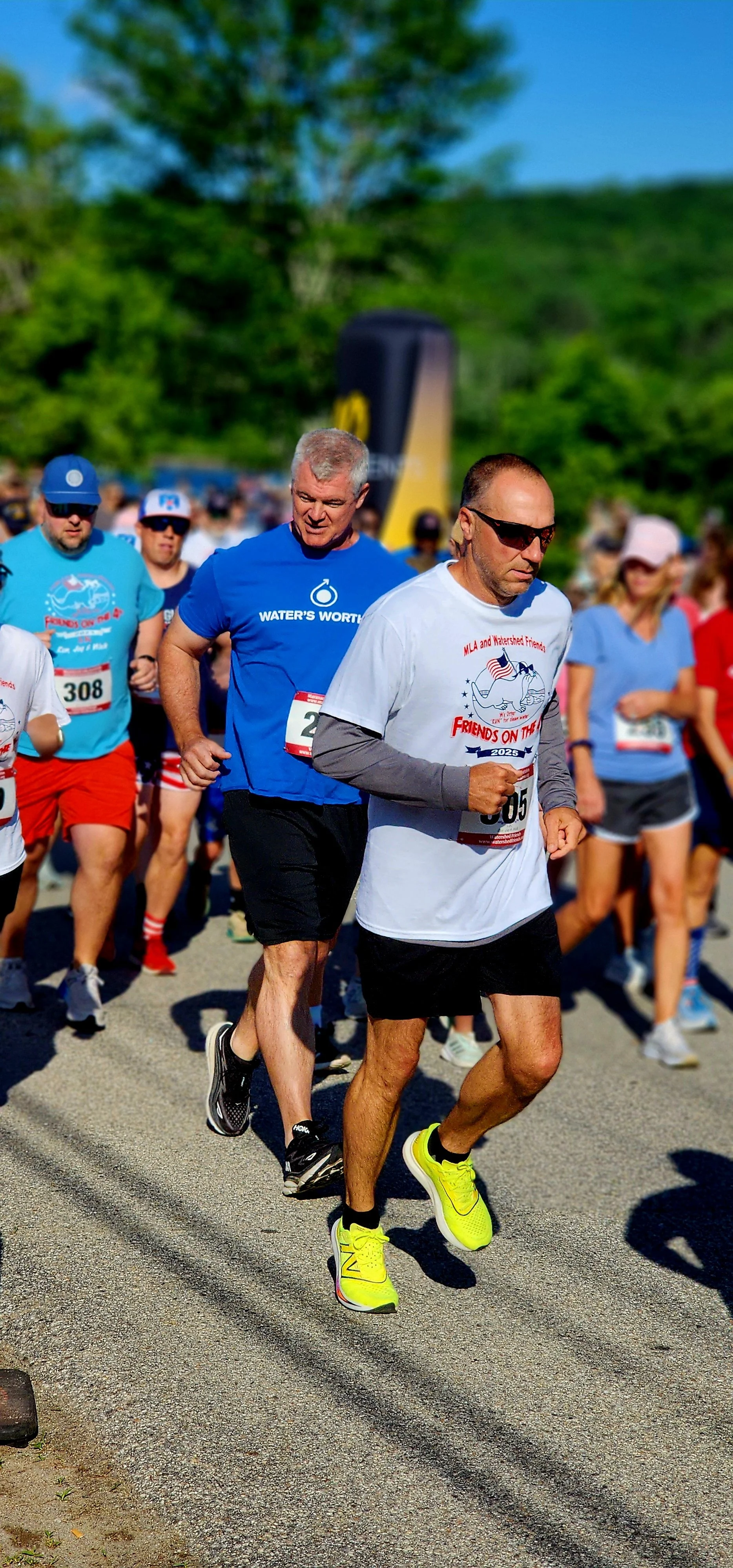 A crowd of people running