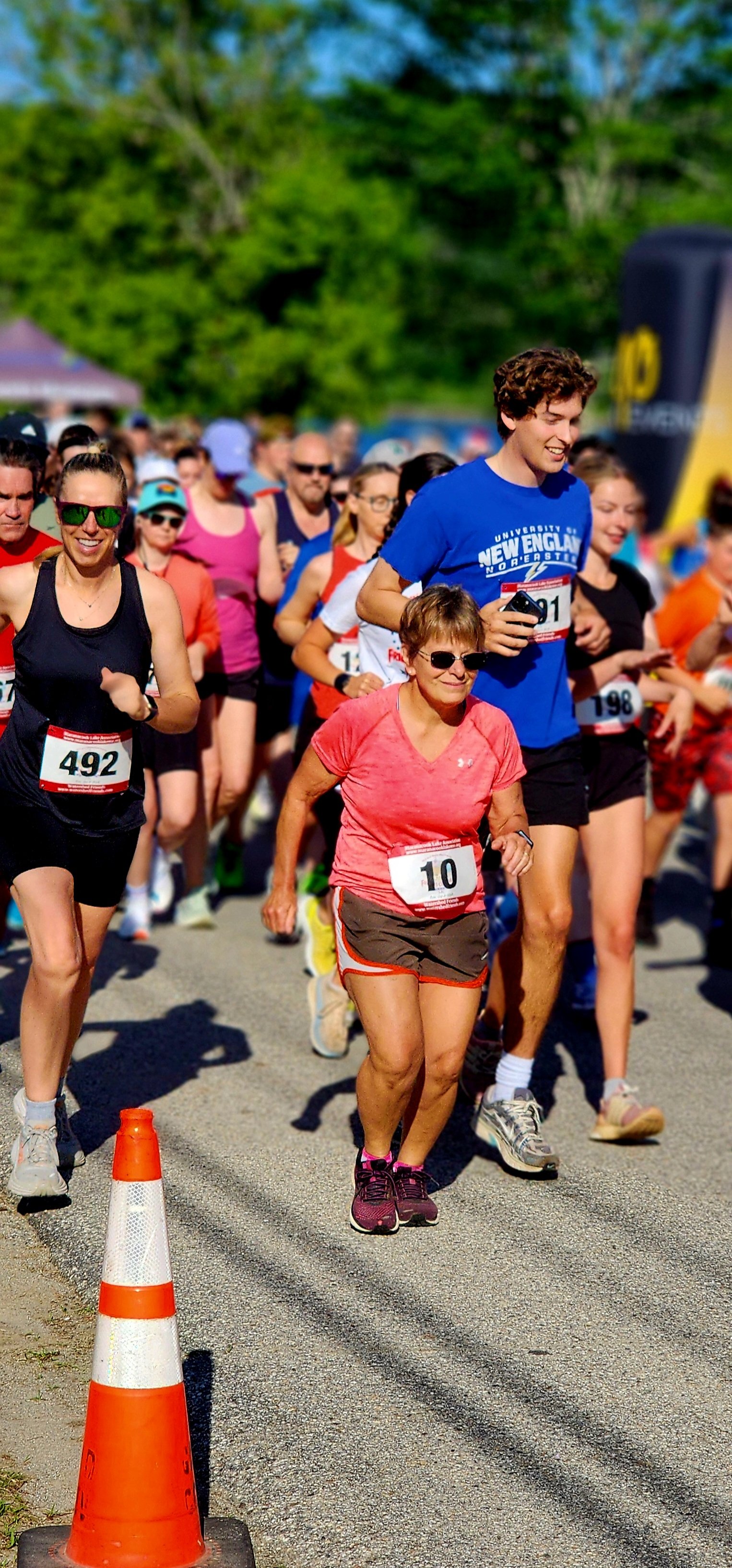 A crowd of people running