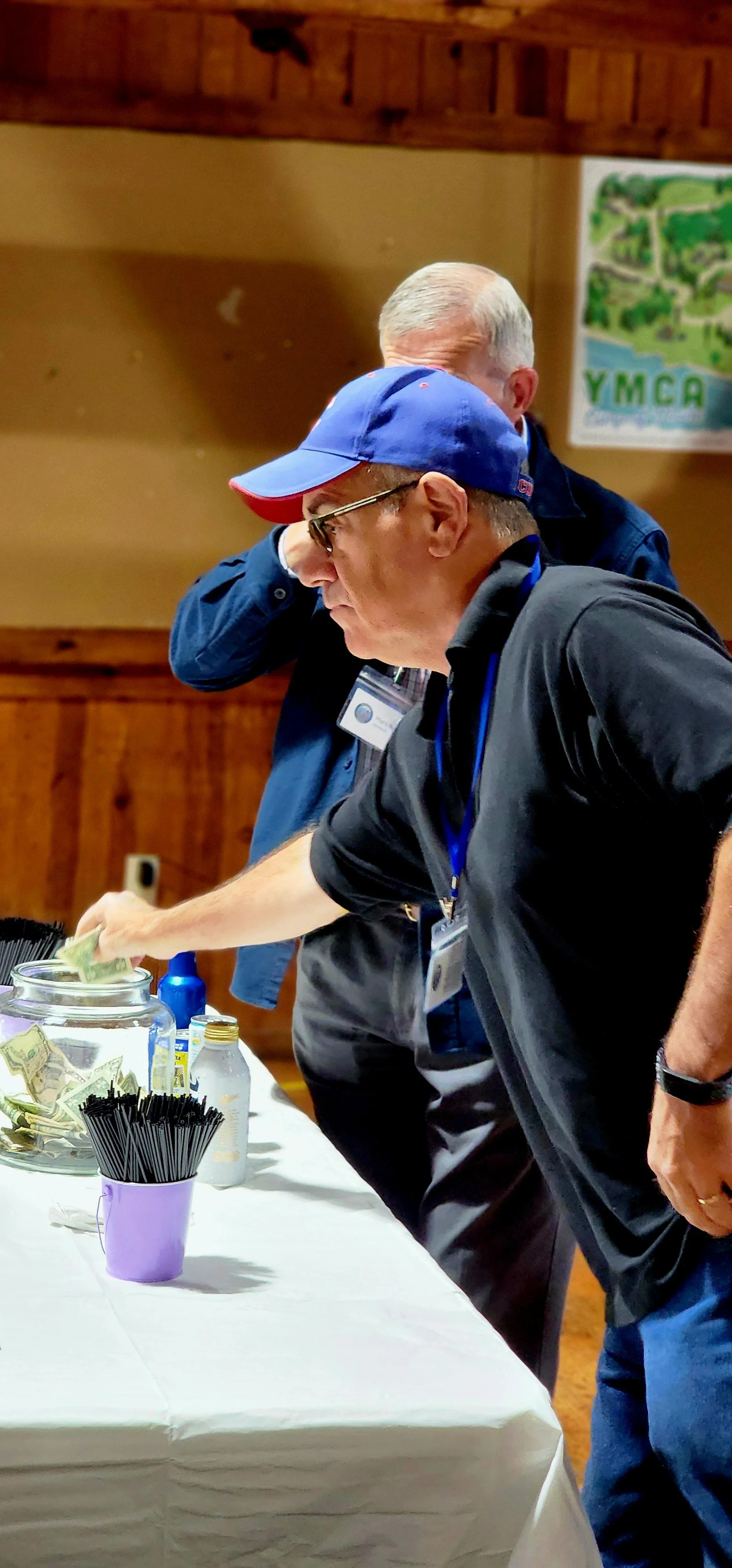 People ordering at the bar