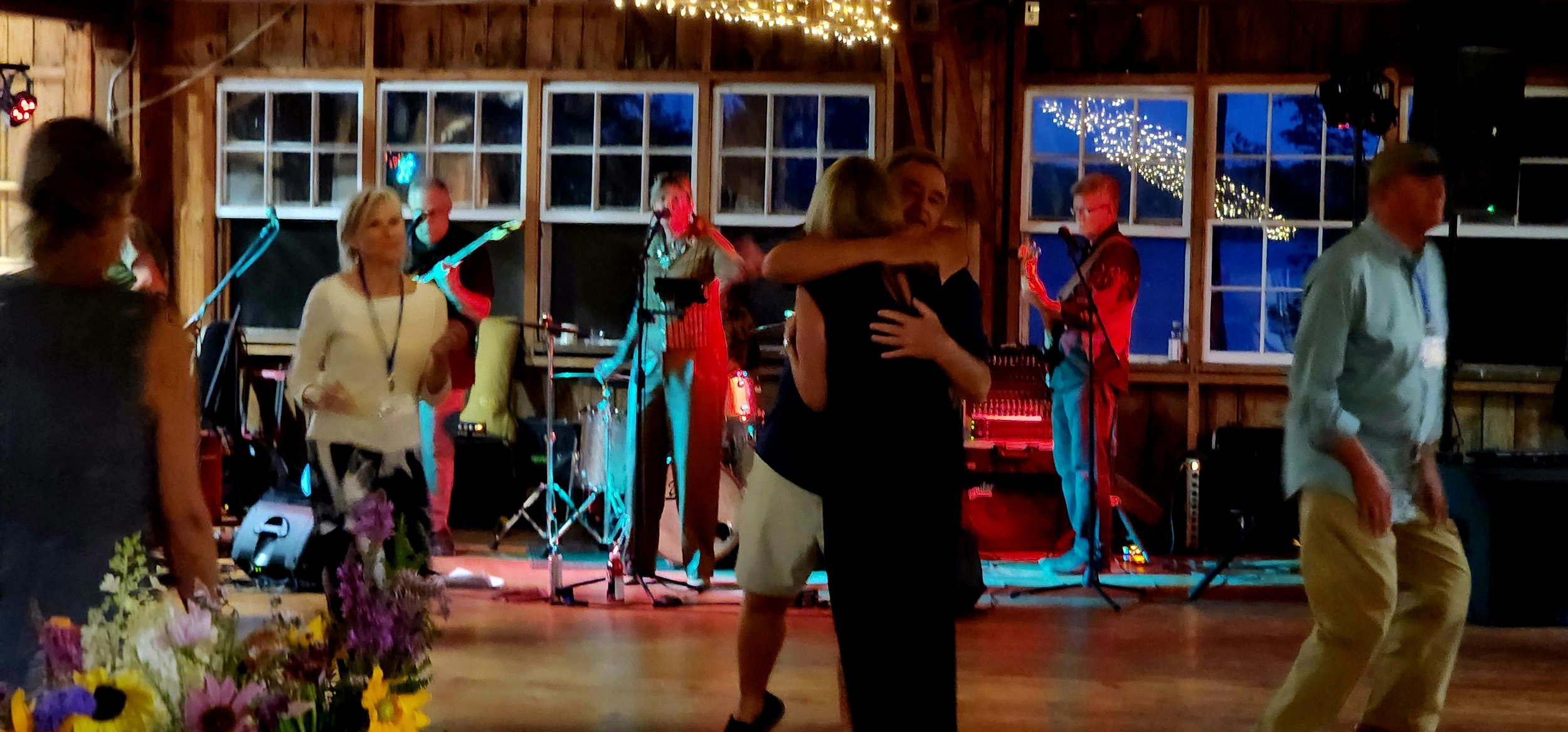 Two people hugging on the dance floor