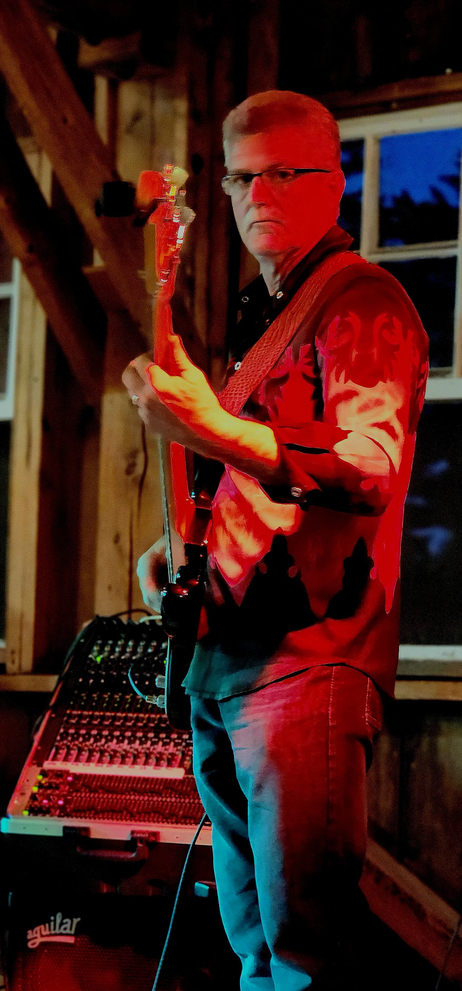 A man playing  guitar