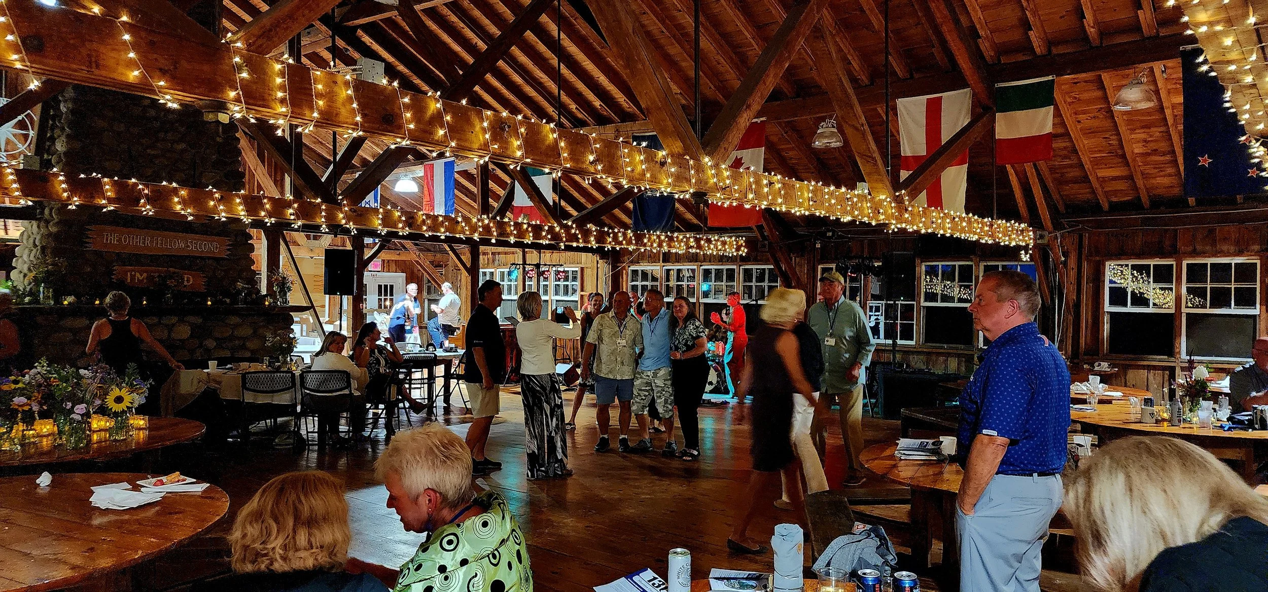 A distance shot of people gathered on the dance floor