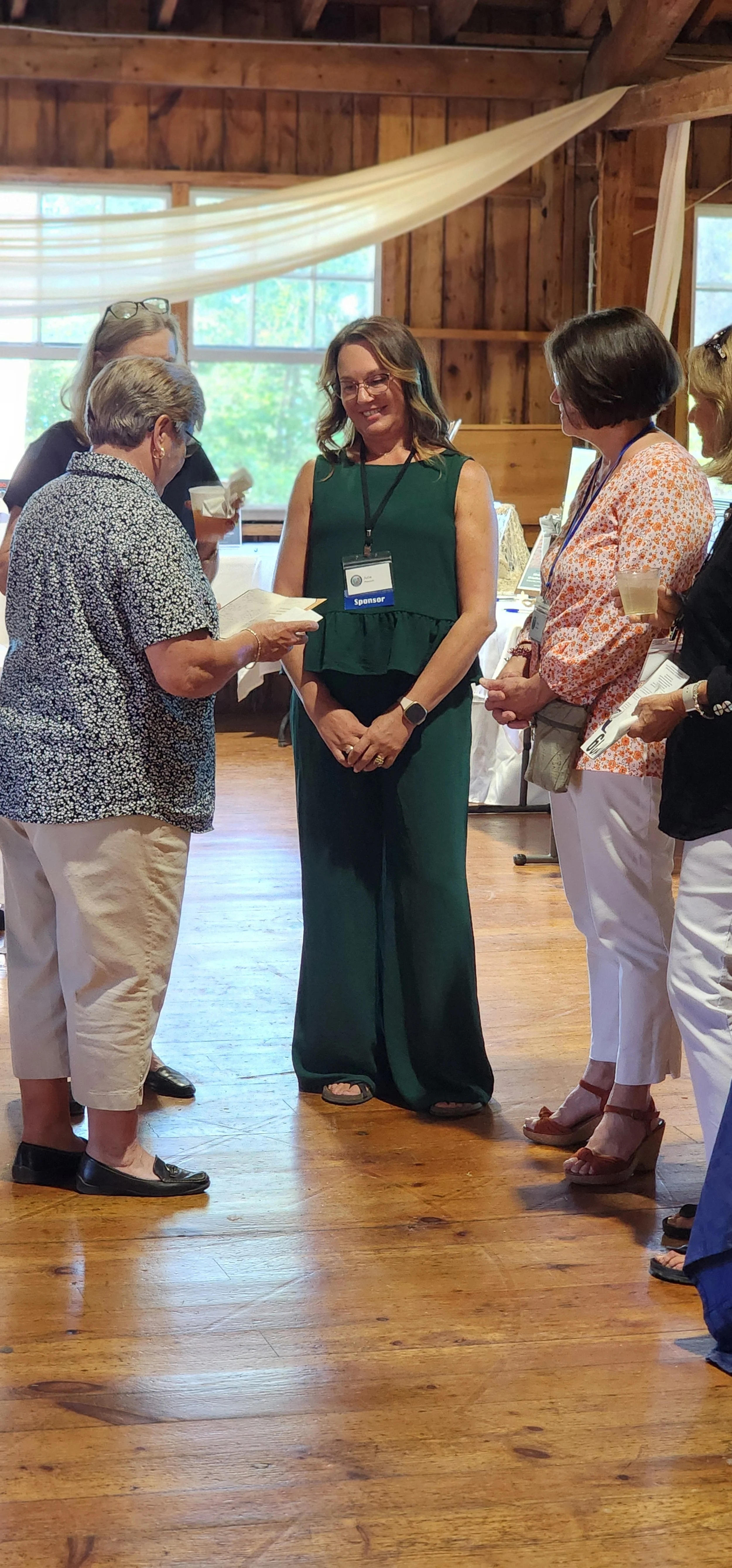 A group of people gathered and talking