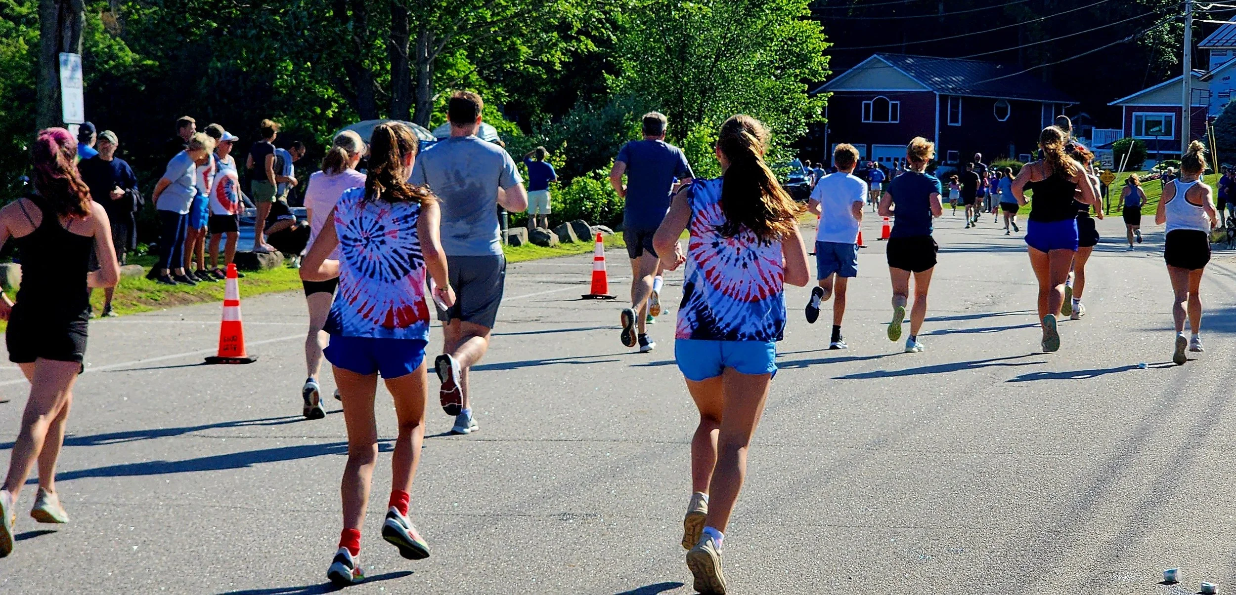 A crowd of people running