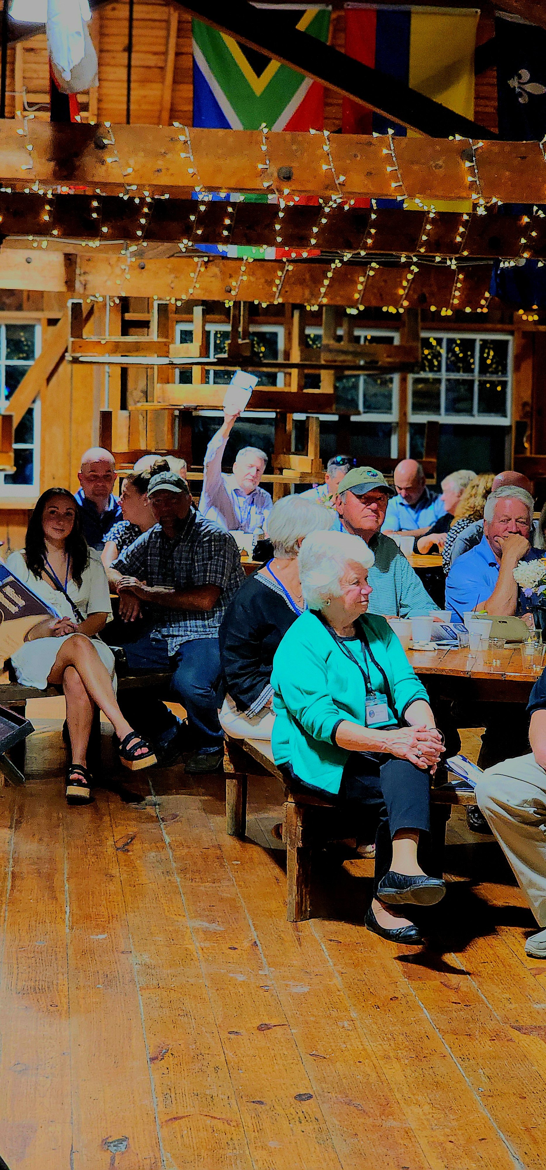 A distant shot of people sitting at tables
