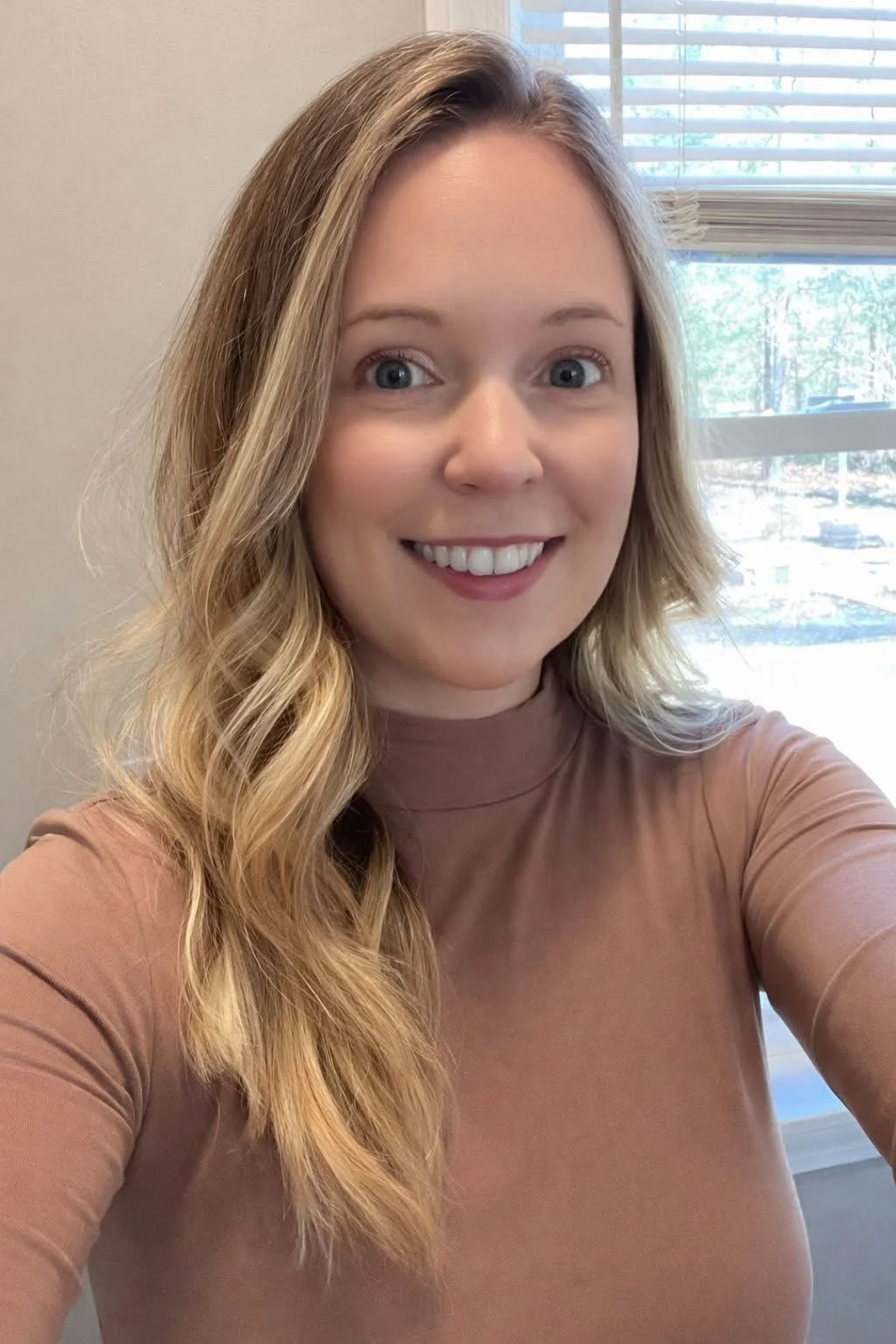 Kristin Sweeney providing telehealth counseling from home office