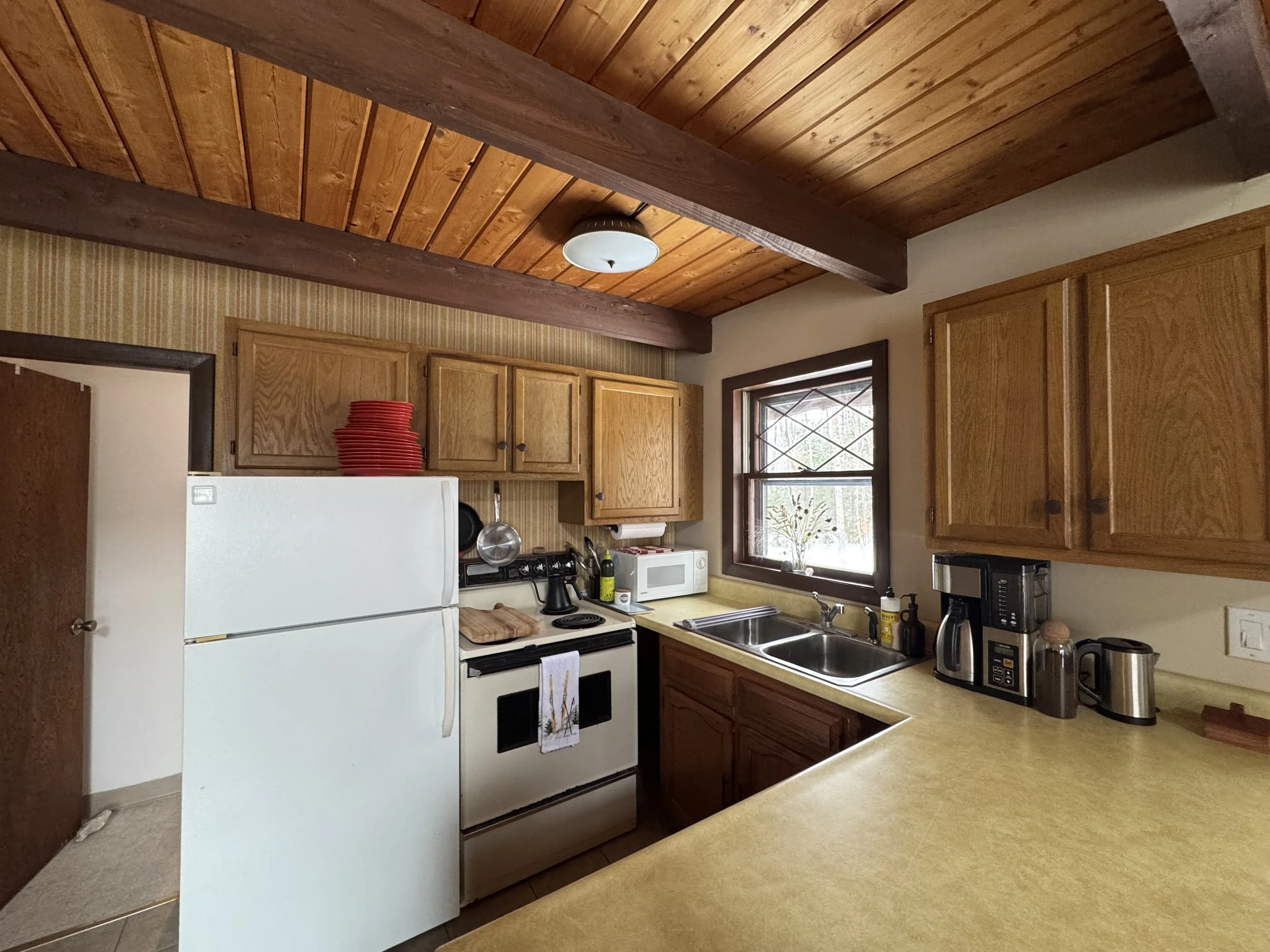 Kitchen with amenities: coffee, tea, olive oil, seasonings, and more!
