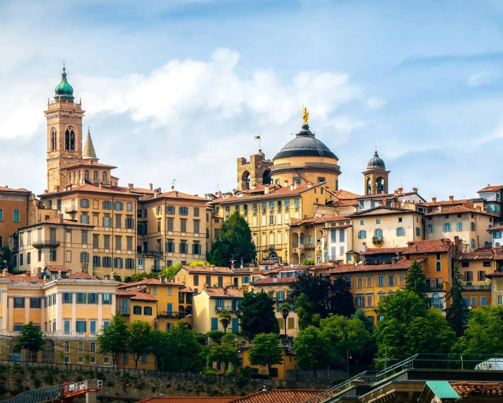 Bergamo | 
Visit the Città Alta, a beautifully preserved walled old town with great views. Around 1 hour by train or car.