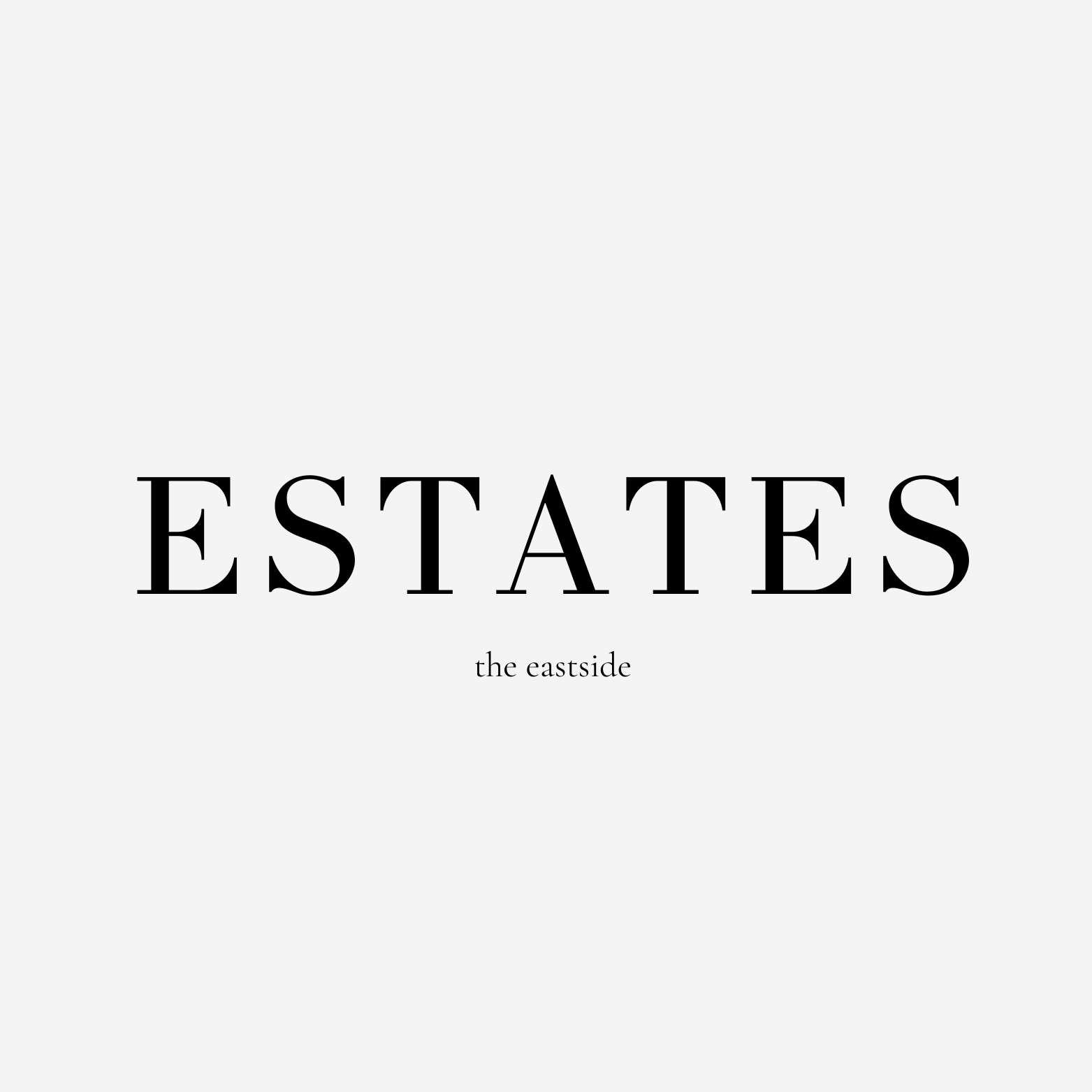 Text graphic with the words 'ESTATES' in large black font and 'the eastside' in smaller font beneath, on a light gray background.