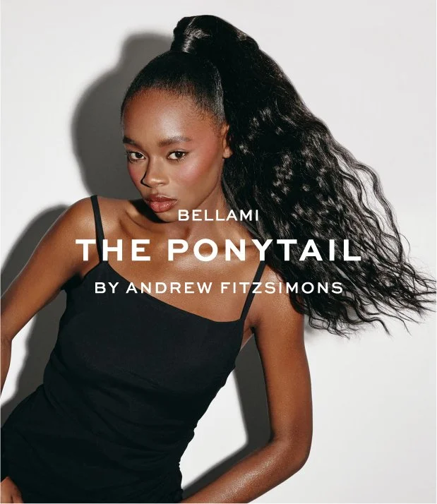 Book cover titled "The Ponytail" by Andrew Fitzsimmons, featuring a woman with long, curly ponytail wearing a black sleeveless top, standing against a plain background.