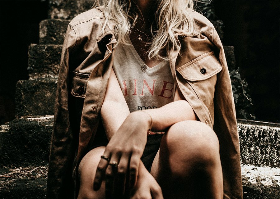 Woman in Lehi Utah sitting on concrete steps