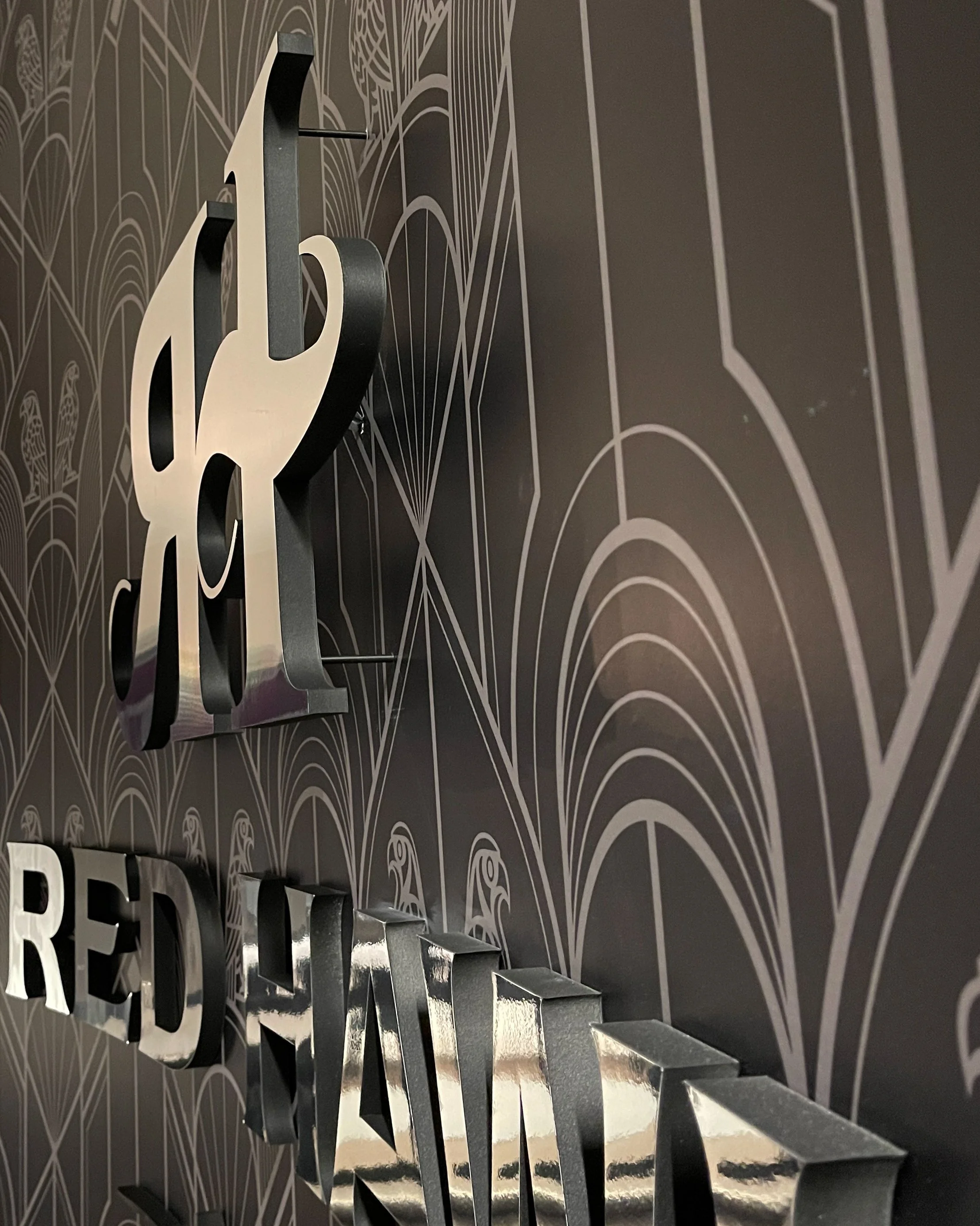 Backlit 3D graphics printed, cut, and installed for the Sacramento Kings' new Red Hawk lounge