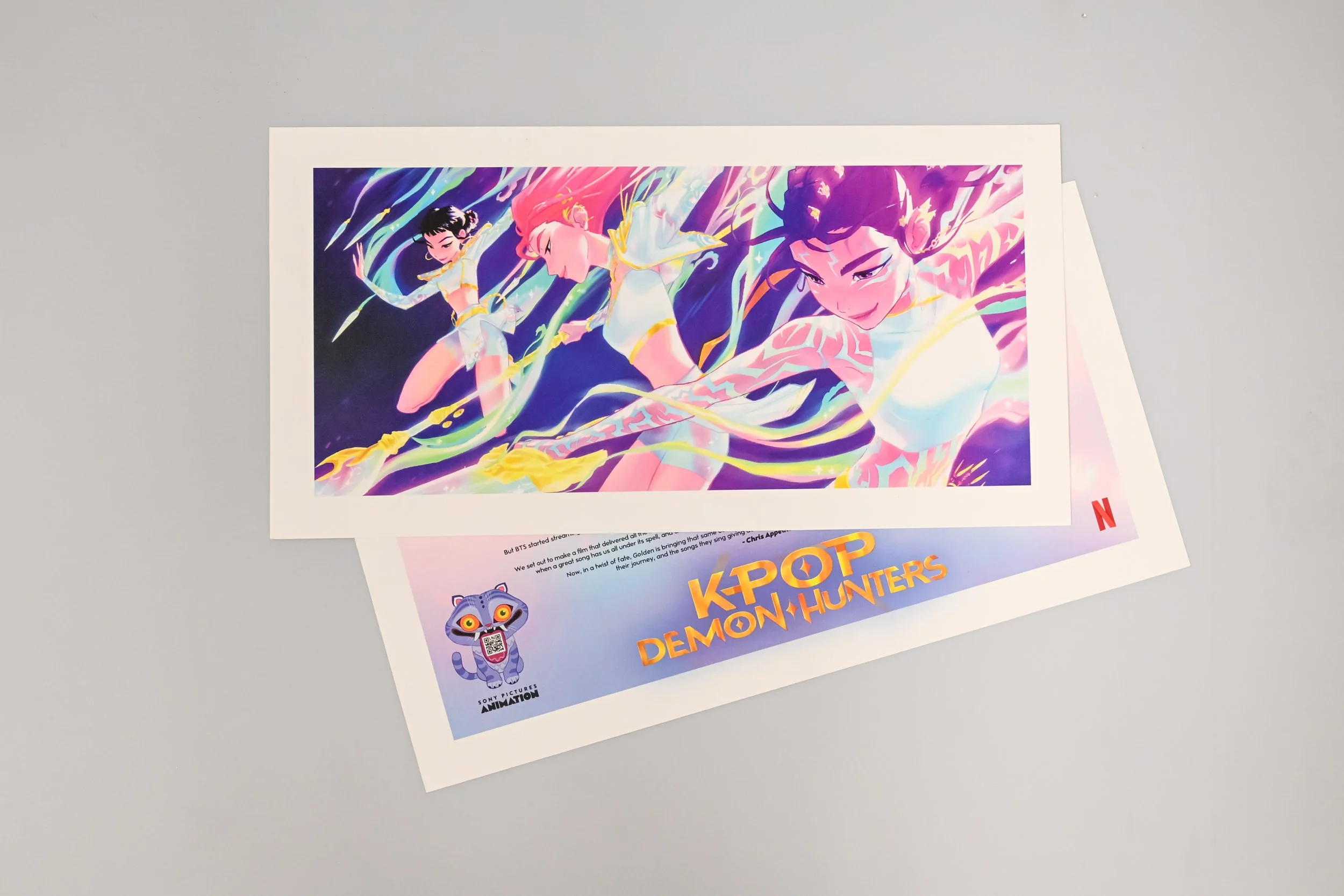 Colorful illustrated poster for 'Kpop Demon Hunters' printed for Netflix