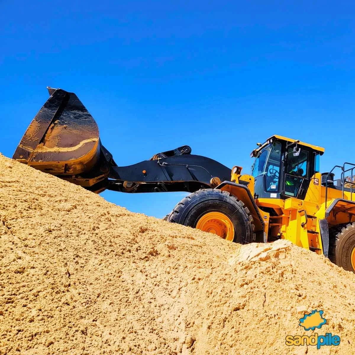Frac sand logistics operation in the Permian Basin using belly dump trailers