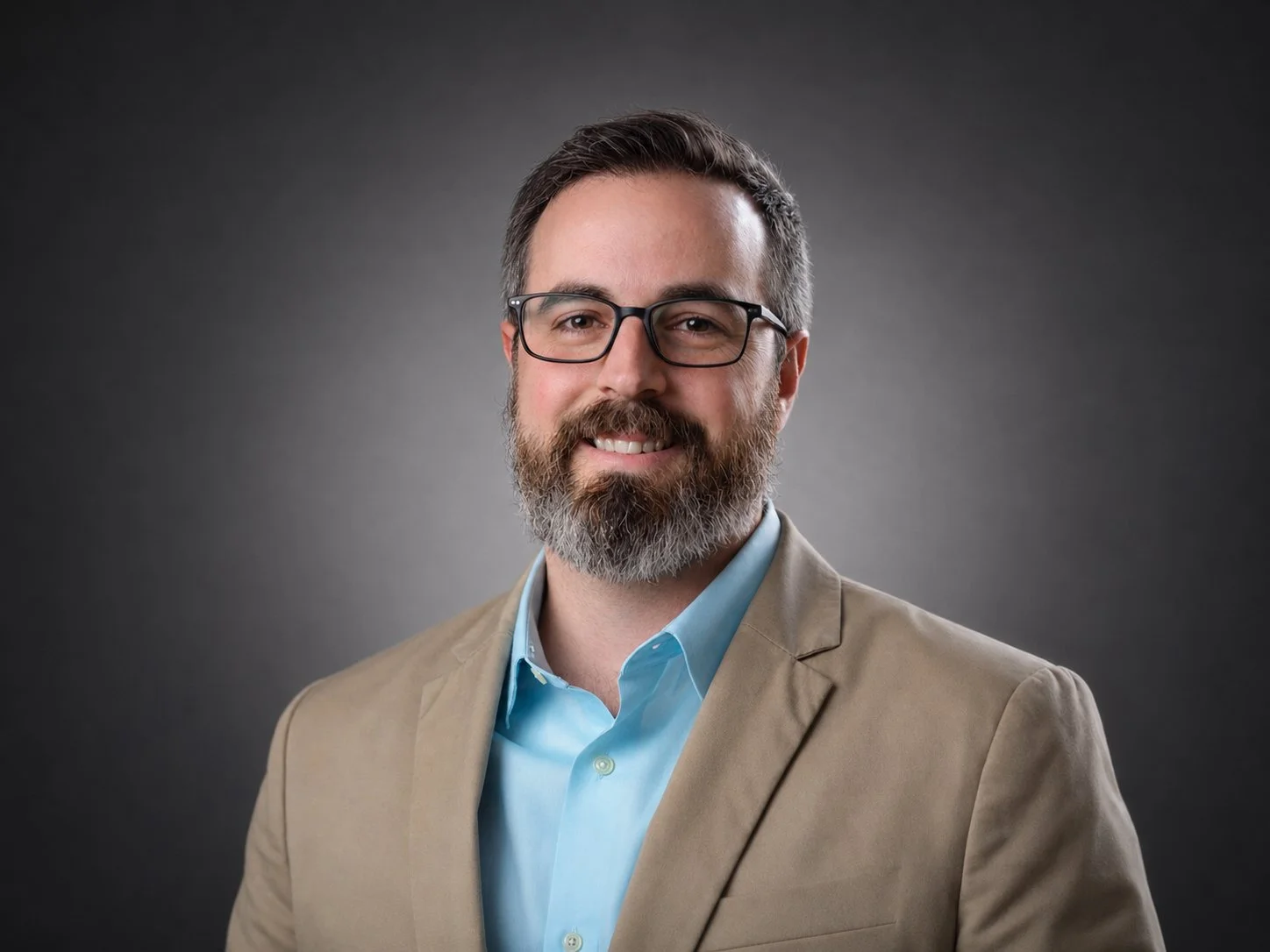 Simeon Foster headshot, vice president of operations at audio visual company OAV, about us page on website.