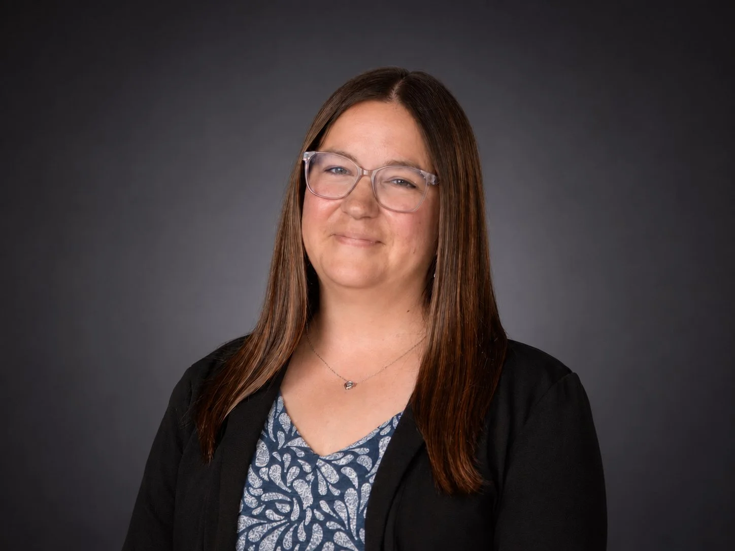 Kasey Nemetz headshot, vice president of finance at audio visual company OAV, about us page on website.