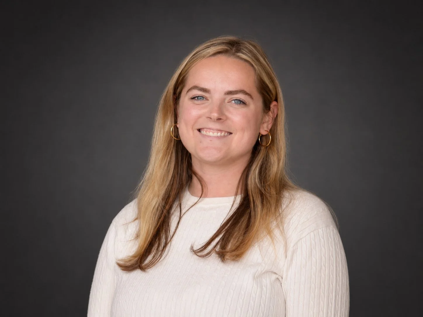 Jess Boyer, brand and marketing coordinator at audio visual company OAV, about us page on website.