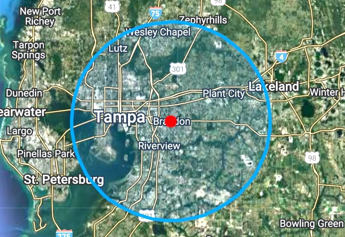 Map of Tampa, Florida, with a blue circle centered on downtown Brandon, highlighting surrounding cities including Valrico, Wesley Chapel, Tampa, Seffner, Bloomingdale, Plant City, and Riverview. Central Florida Real Estate Sign Post Installation