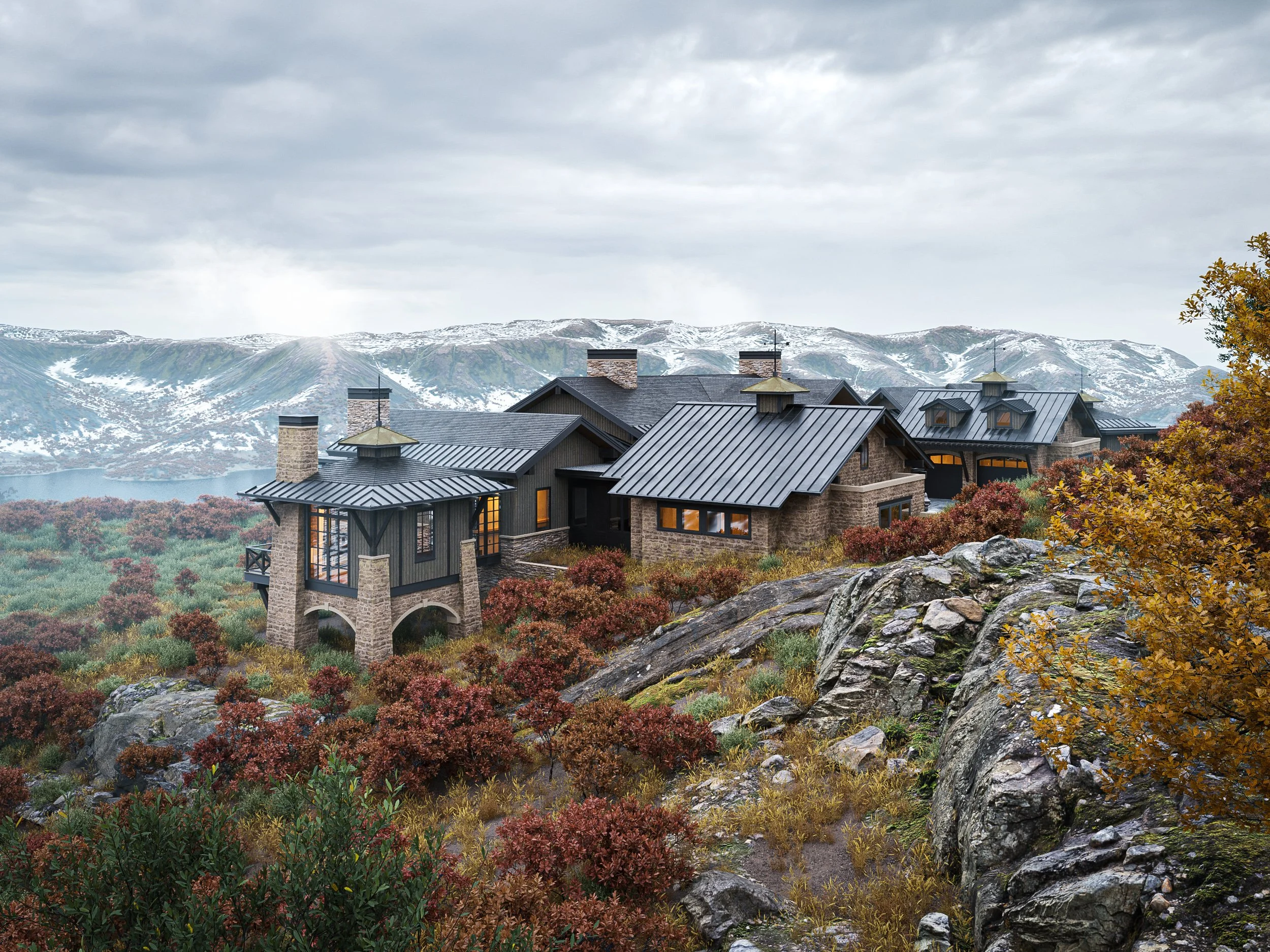 A large house with dark gray metal roofs and stone and wood walls, situated on a rocky hillside amidst autumn foliage, with snow-capped mountains in the background under cloudy skies.
