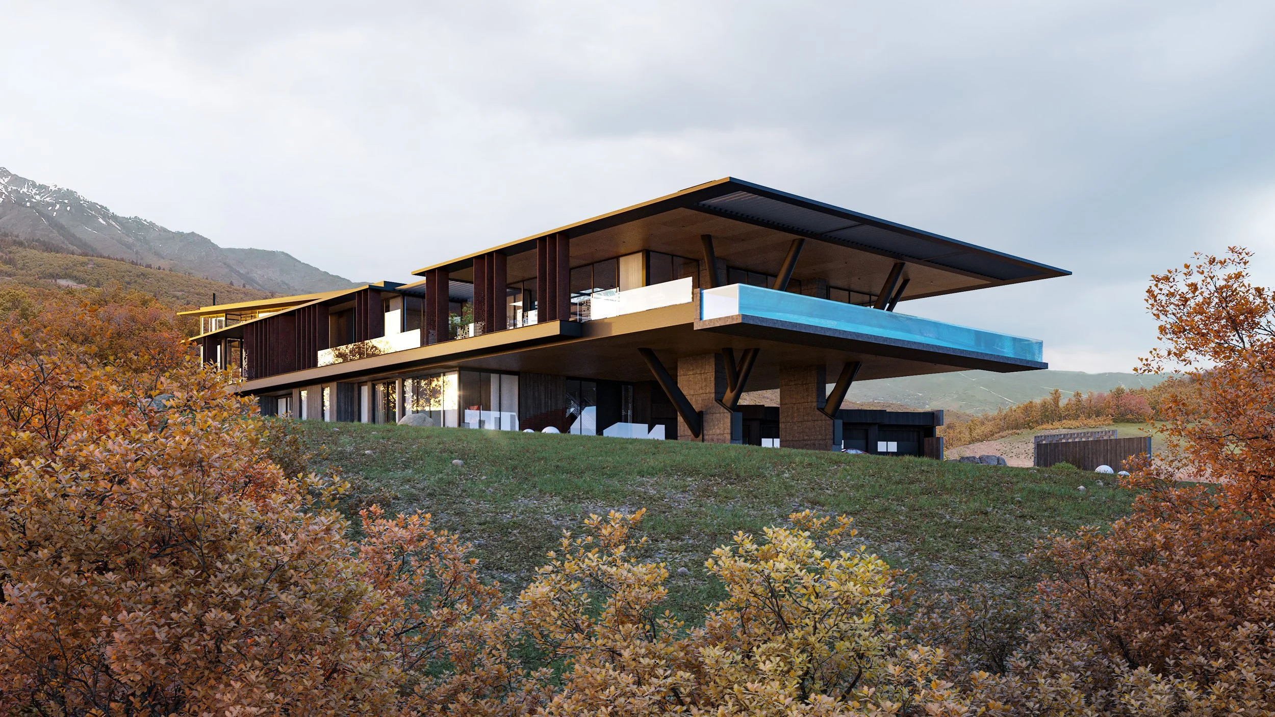 Modern multi-level house with large overhanging roofs, supported by V-shaped columns, situated on a hillside surrounded by autumn-colored trees and mountains in the background.