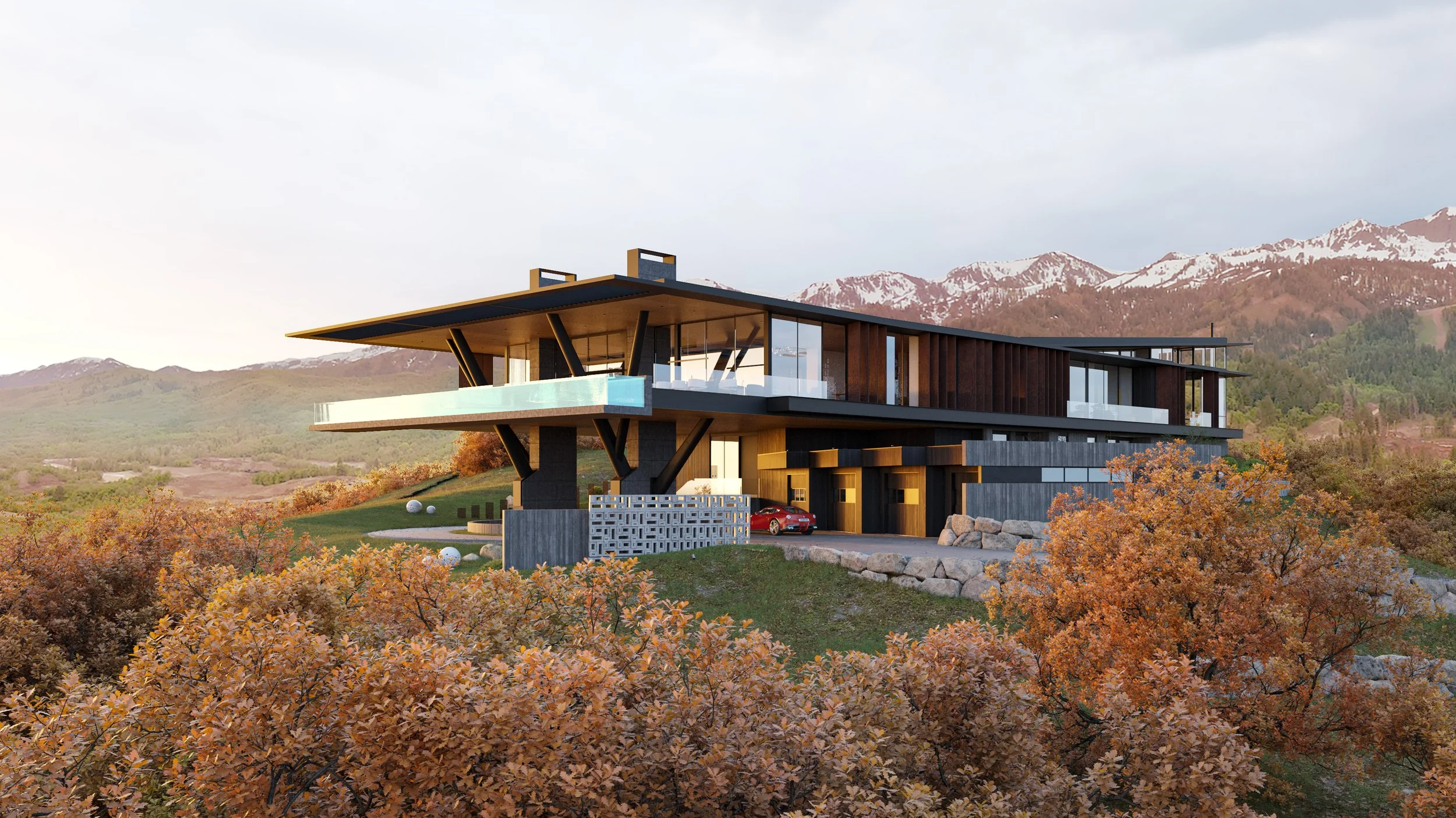 Modern house with large glass windows and a balcony, situated on a hillside with autumn trees and mountains in the background.