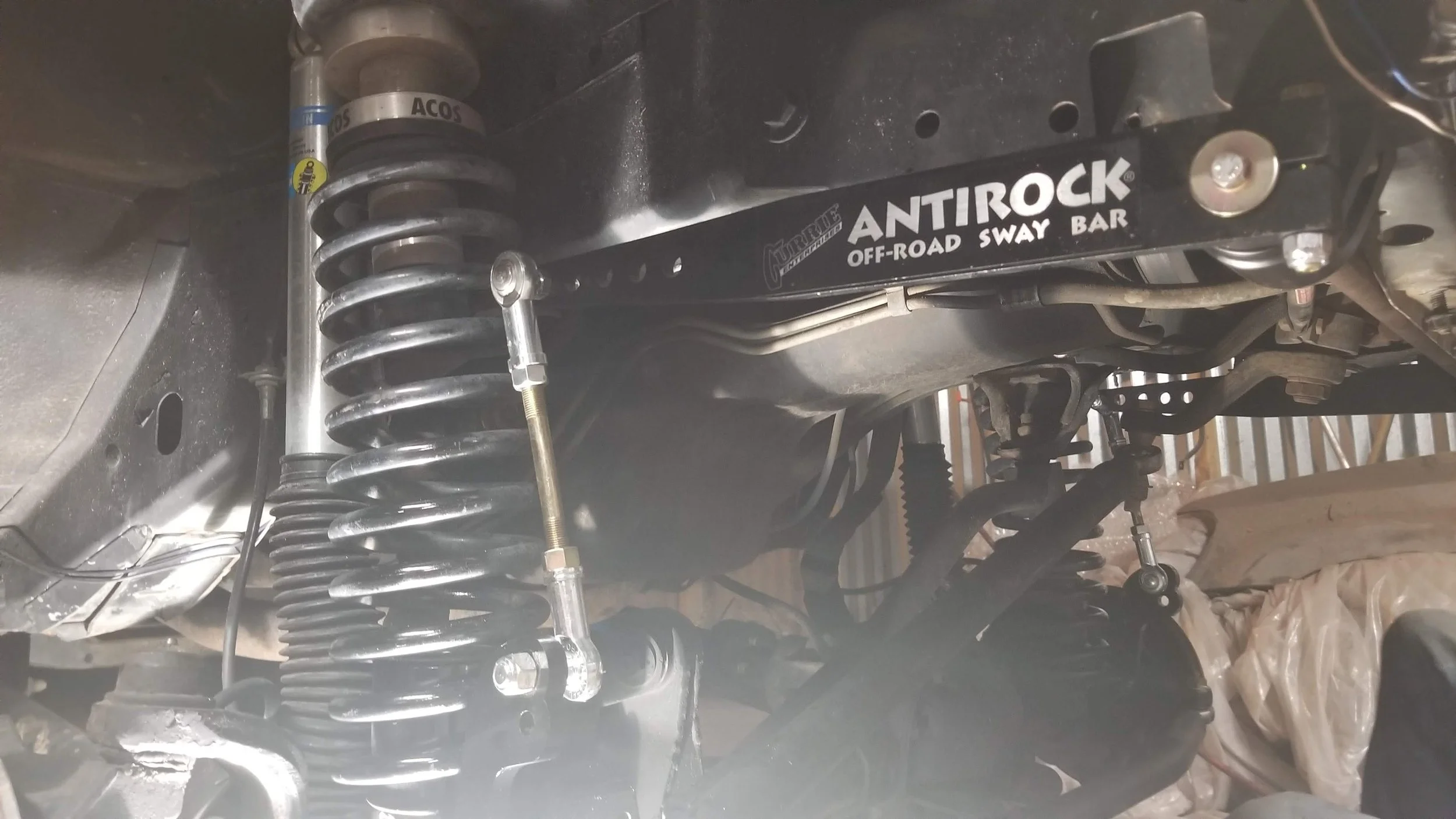 Currie Antirock Sway Bar w/ Bilstein Shocks and ACOS adjustable bump stops.  No disconnecting necessary with all of the suspension articulation and better on-road handling. 