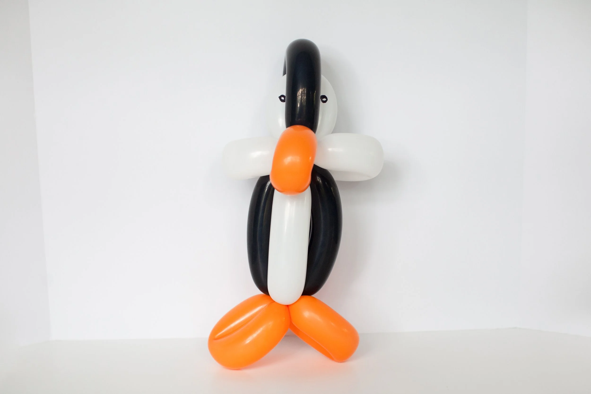 Penguin balloon twisting example