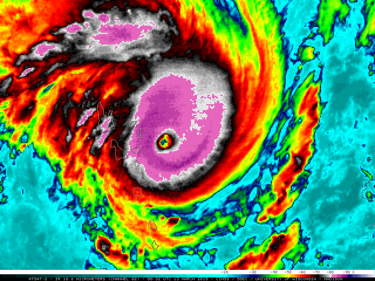 Colorized satellite image of a hurricane with a well-defined eye, surrounded by swirling clouds and intense storms.