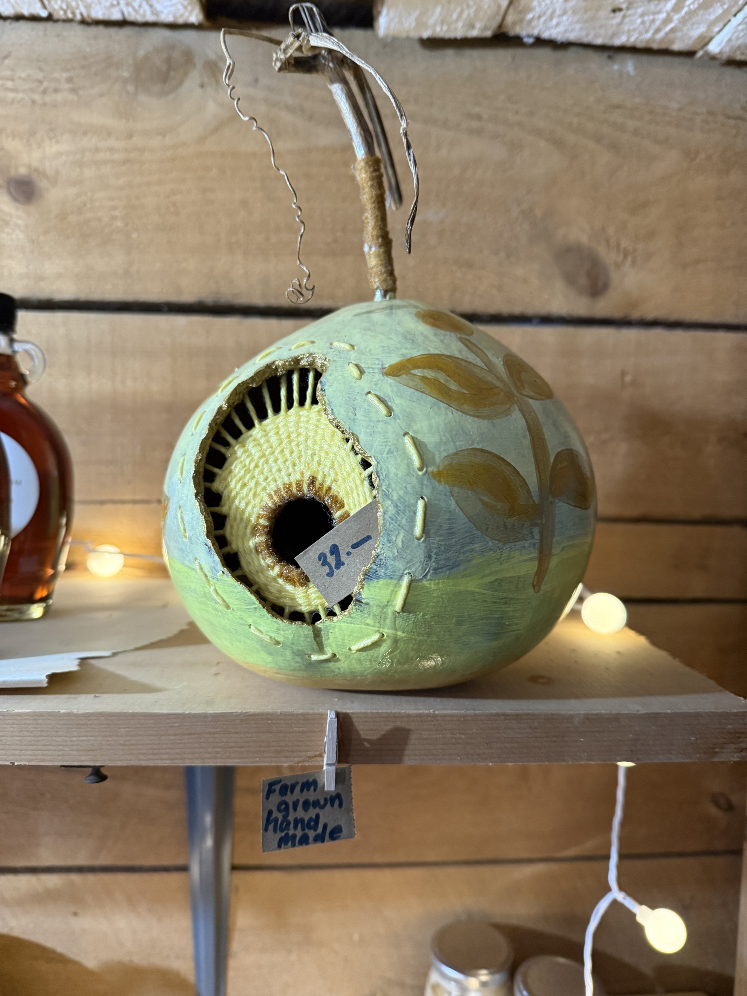 this little gourd was eaten by mice, but with some clever weaving later, the birdhouse emerges