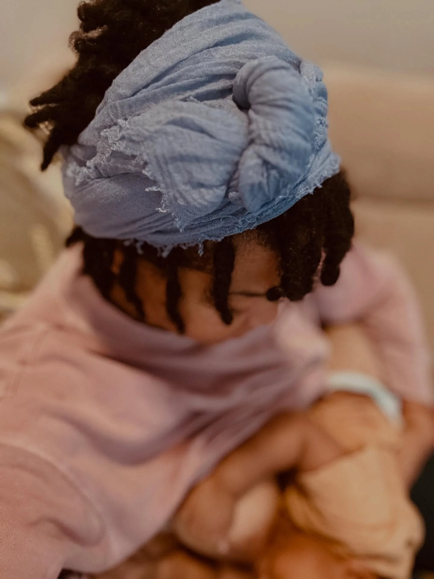 Wrapping the head has been done for thousands of years across many cultures. 

The crown holds much sacred spiritual significance. The crown is where energy can leave and also be absorbed. 

This is also true for the womb space and feet. 

Many spiri