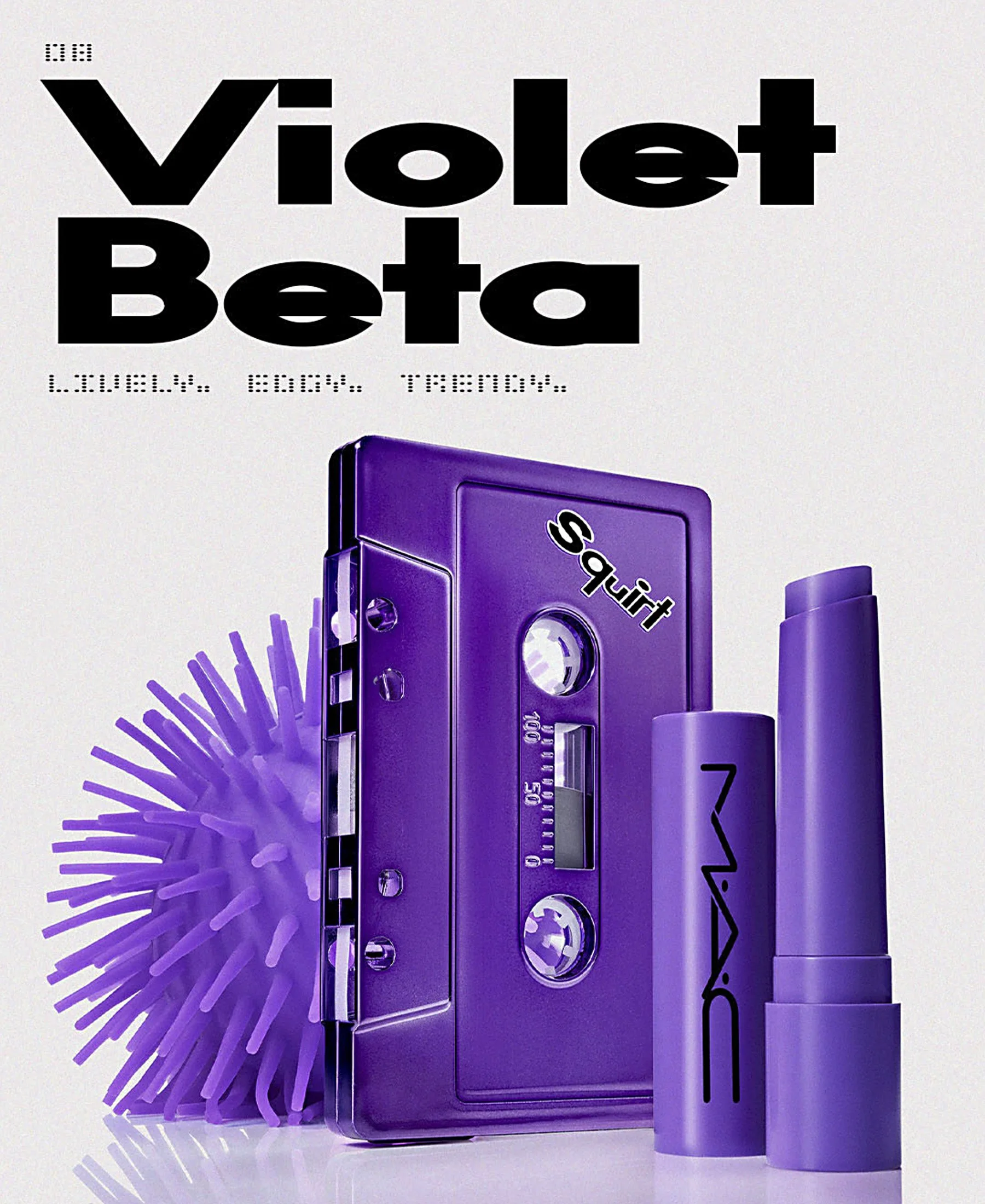 A purple monochromatic compostion with 90's nostalgia props and lip balm are shown on a reflective surface with a light gray background