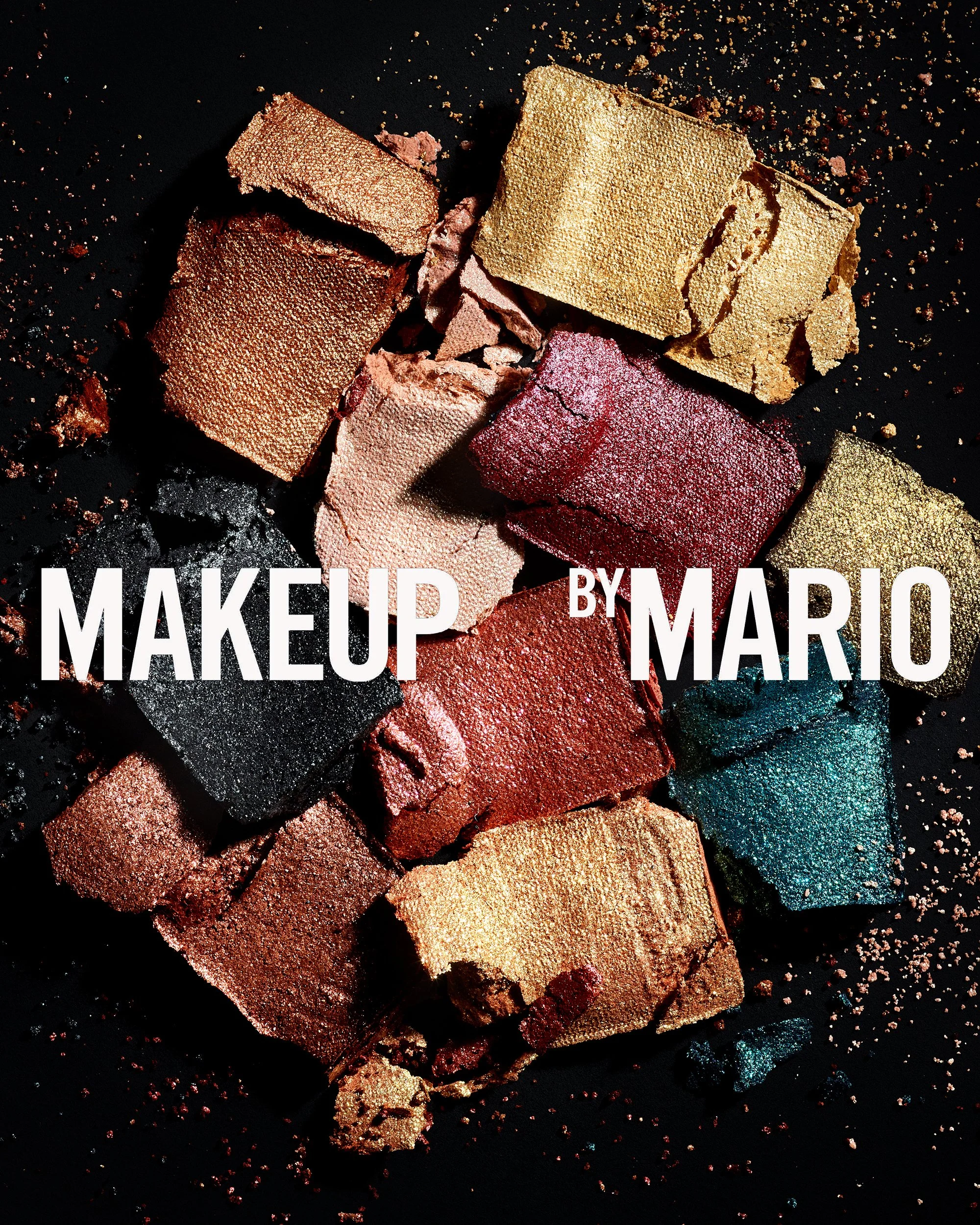 A shade range of mettalic eye makeup products removed from any packaging are A shade range of matte eye makeup products removed from any packaging are arranged in a stylized composition on a black background with scattered textures filling the frame