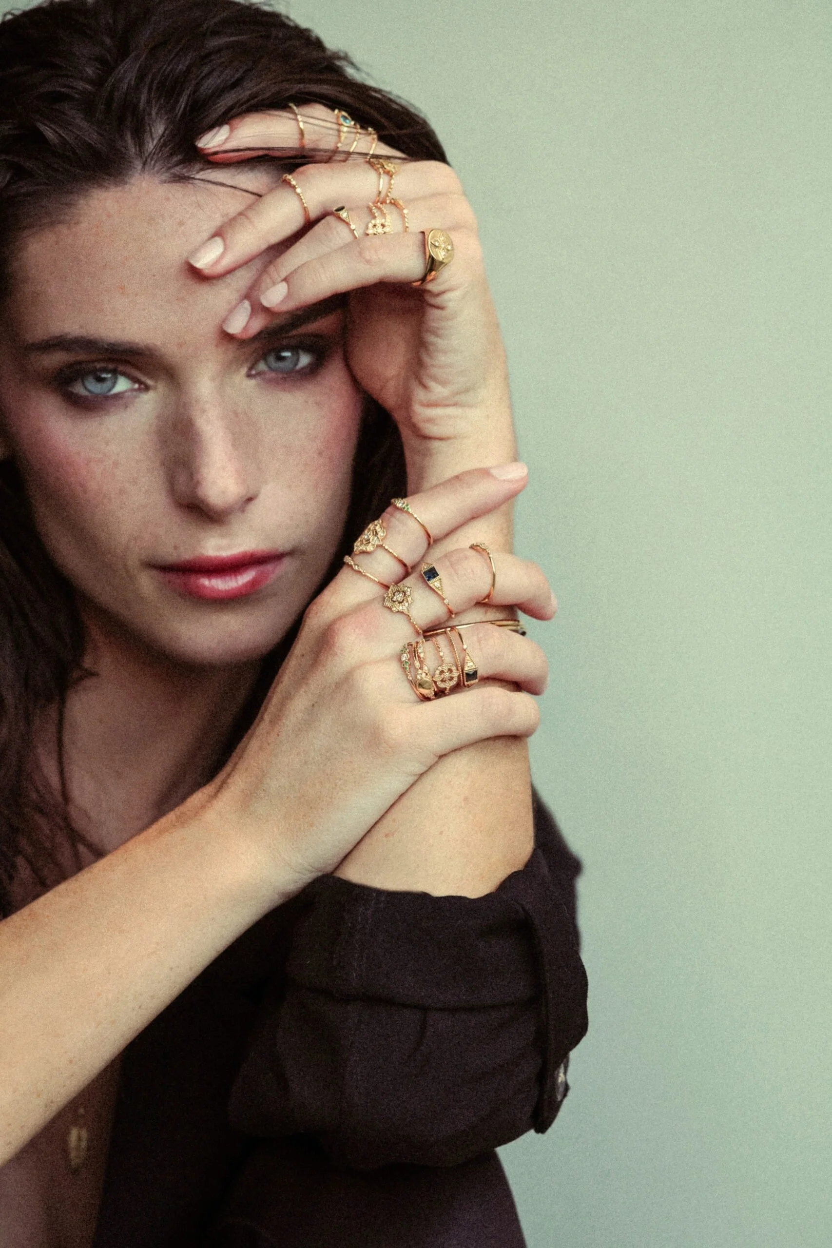 Angele Brousse gold stacking rings on model