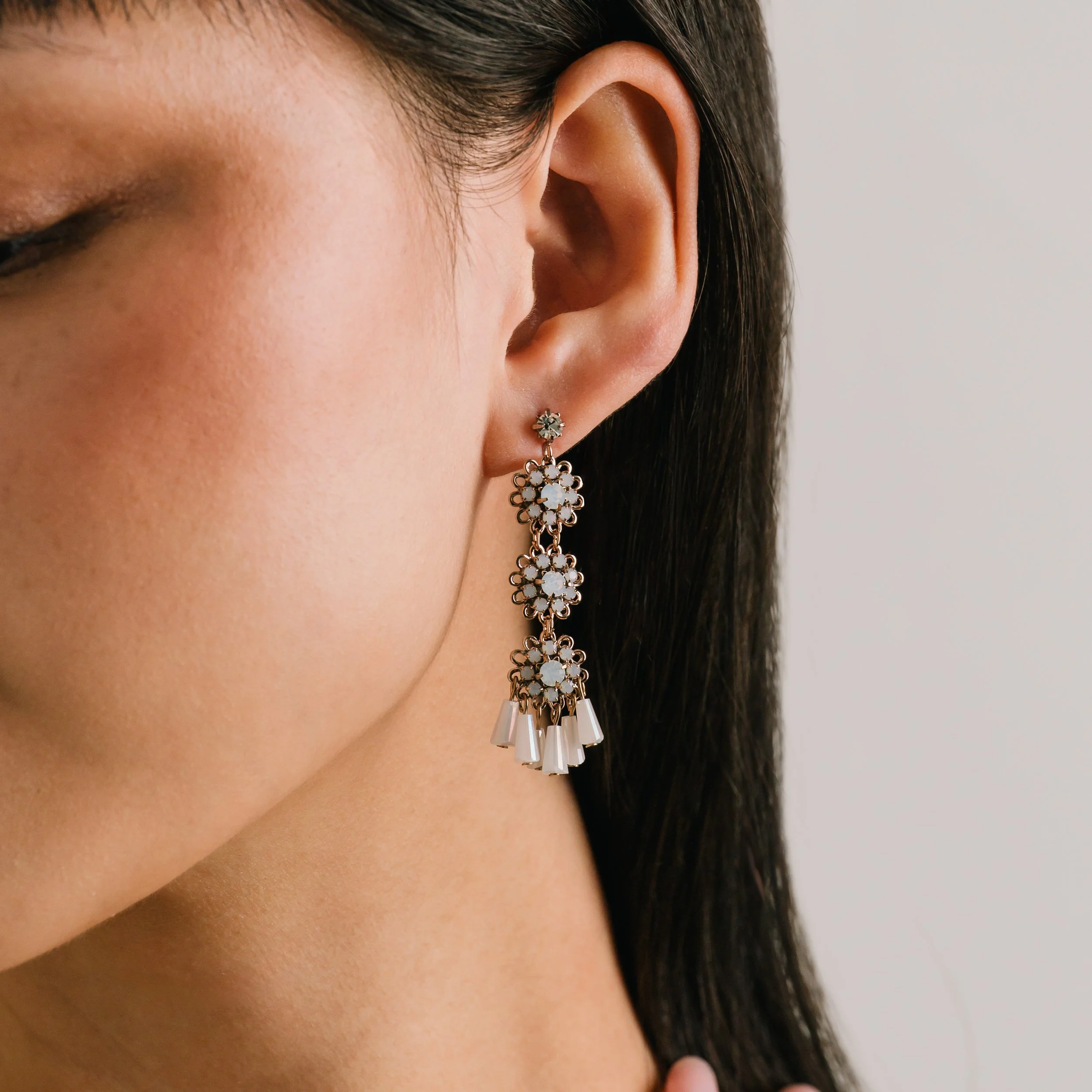 Lover's Tempo jewelry drop earrings on model